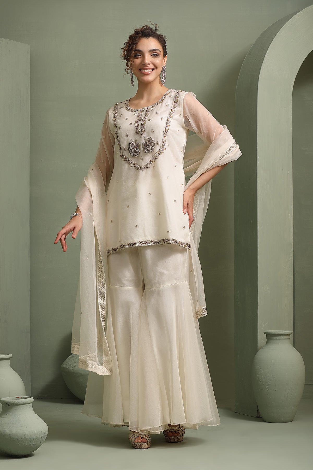 Ivory peacock motif hand-embellished short-kurti, sharara set
