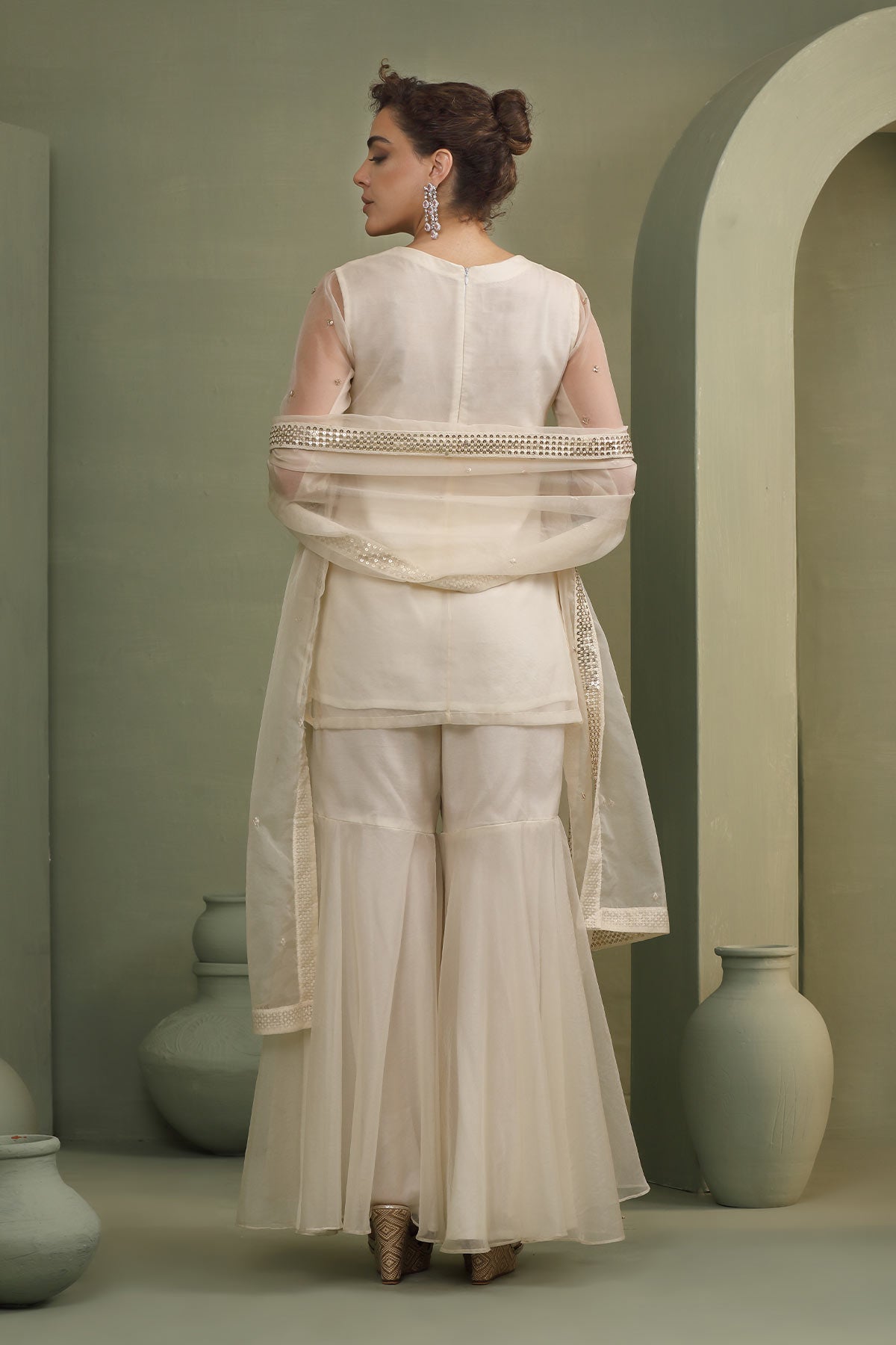 Ivory peacock motif hand-embellished short-kurti, sharara set