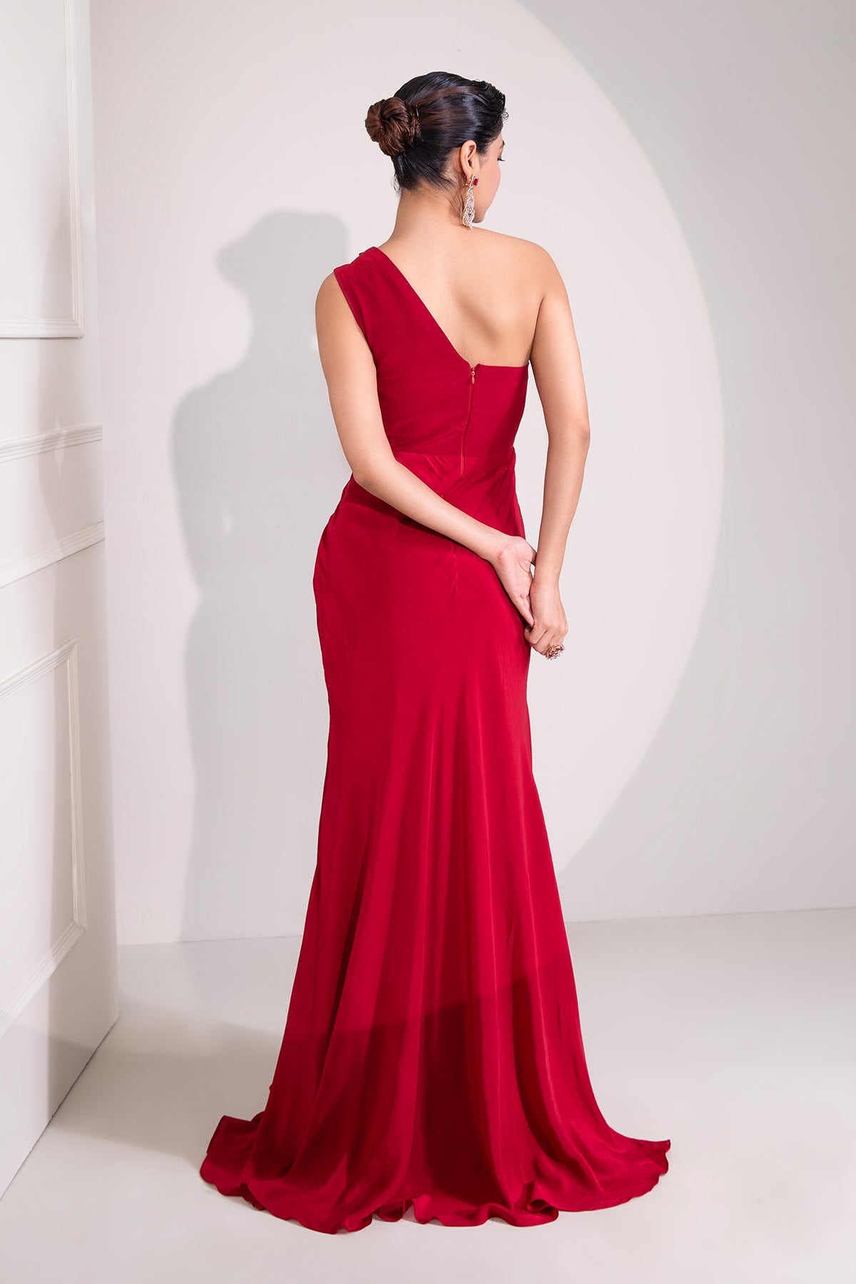 Ruby red one shoulder draped cocktail gown abstract work