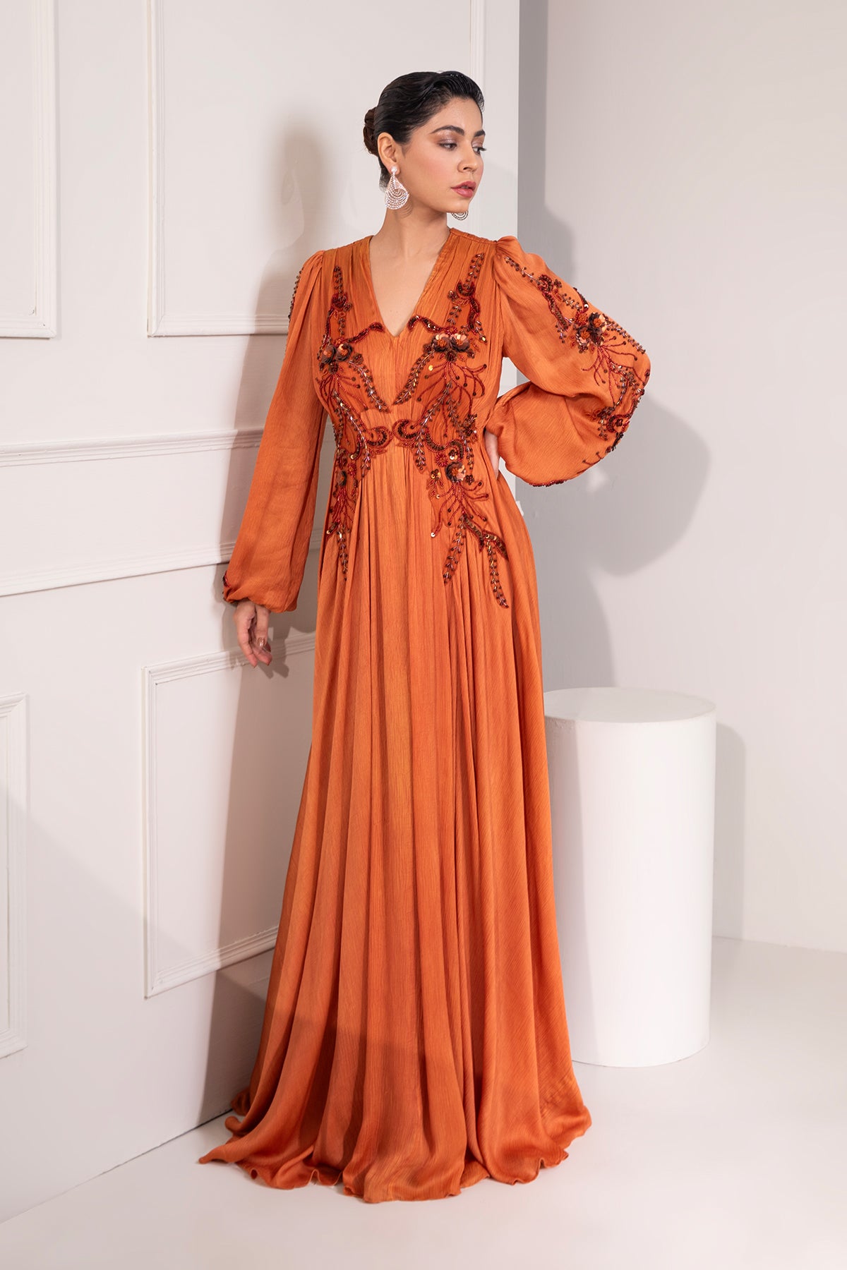 Brunt Orange draped flare gown with intricate tonal embroidery