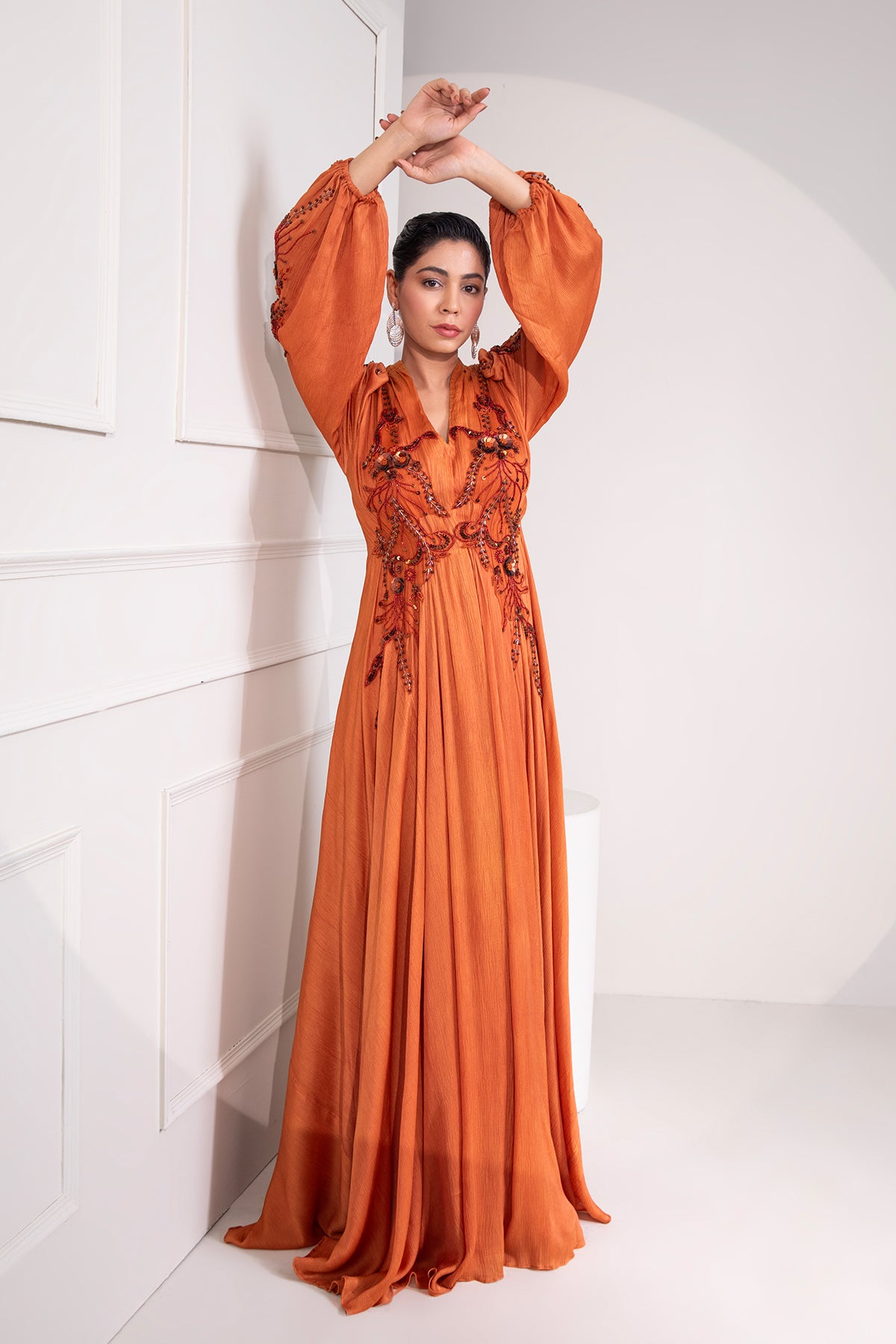 Brunt Orange draped flare gown with intricate tonal embroidery