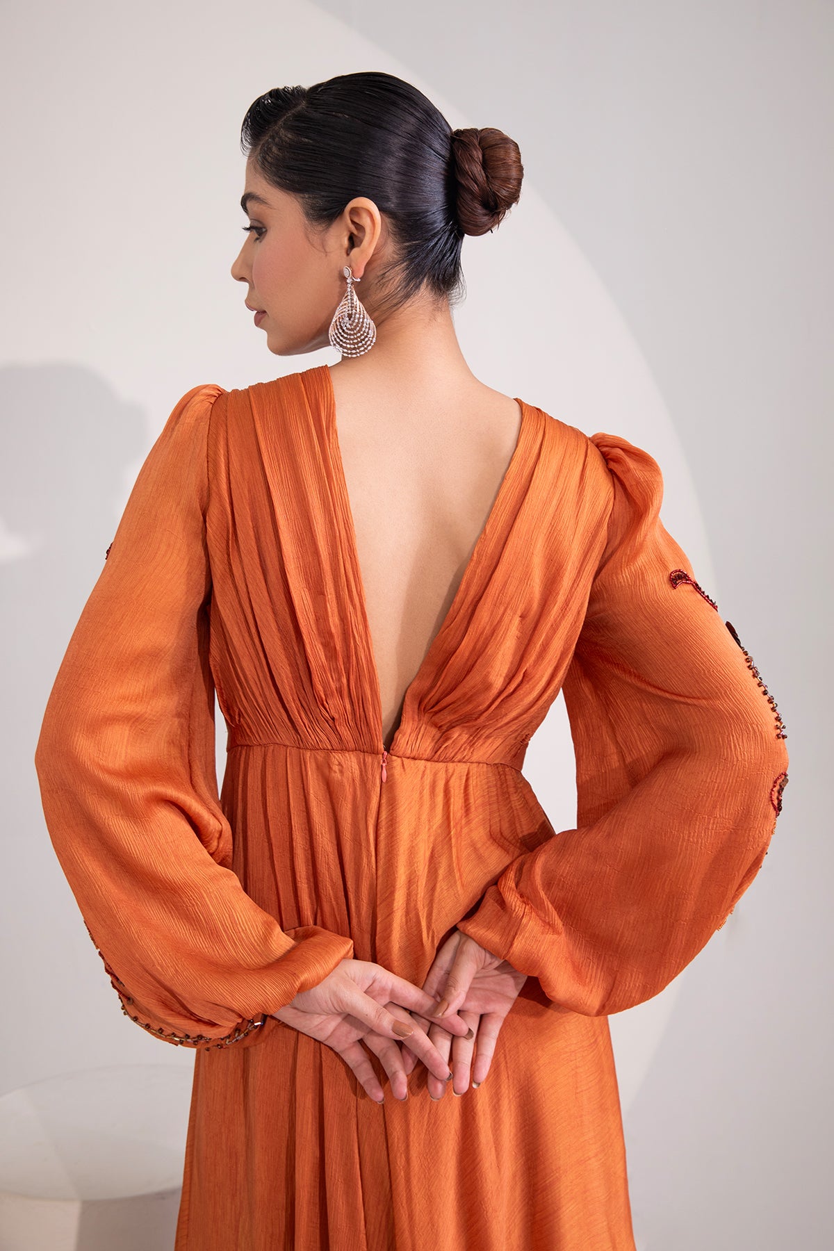 Brunt Orange draped flare gown with intricate tonal embroidery
