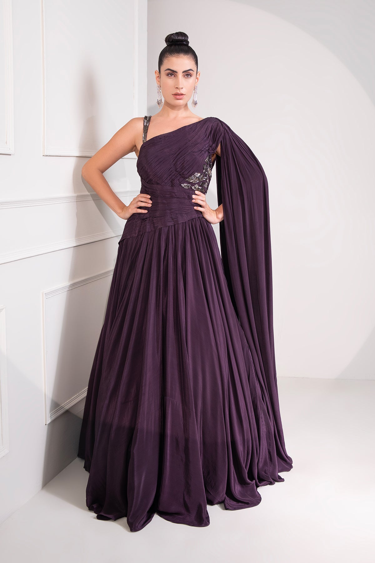 Midnight plum draped cutdana flared gown