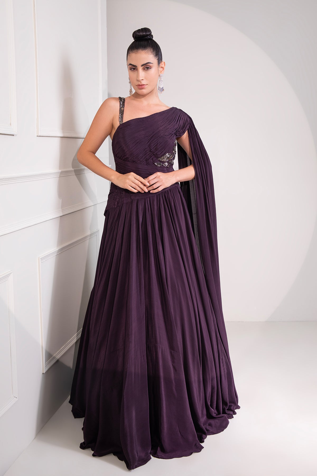 Midnight plum draped cutdana flared gown