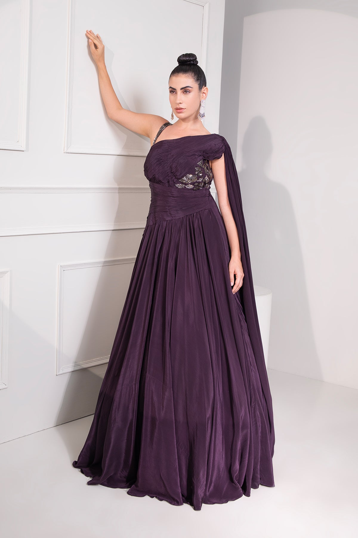 Midnight plum draped cutdana flared gown