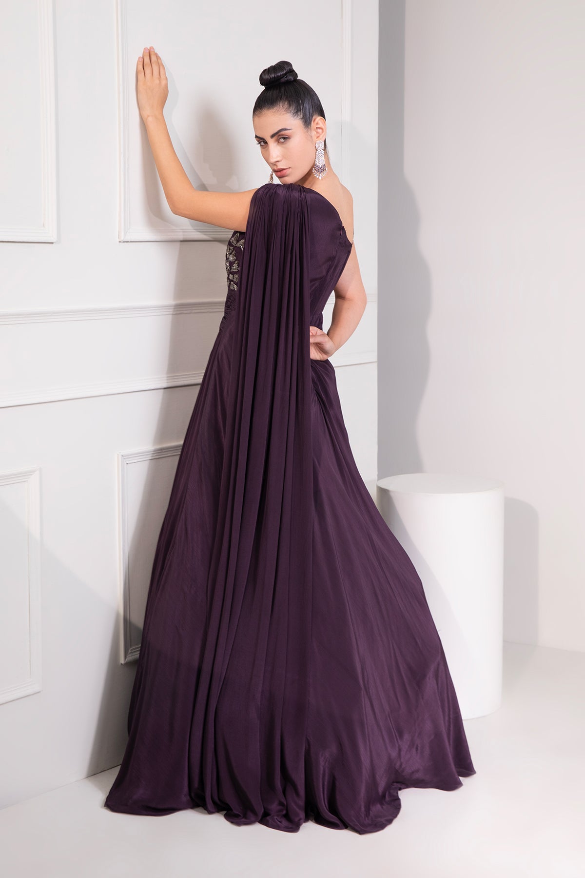 Midnight plum draped cutdana flared gown