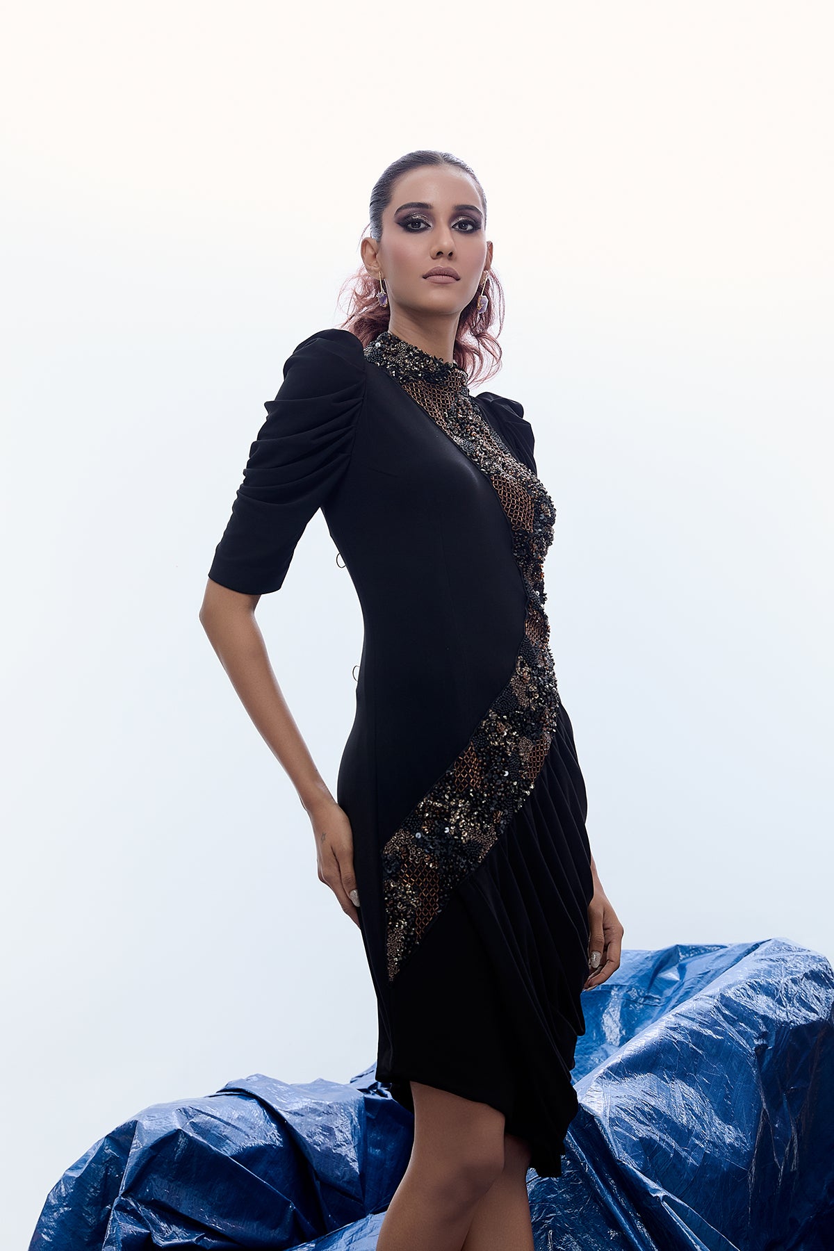 ASYMMETRIC COWL DRESS WITH STATEMENT EMBELLISHMENT