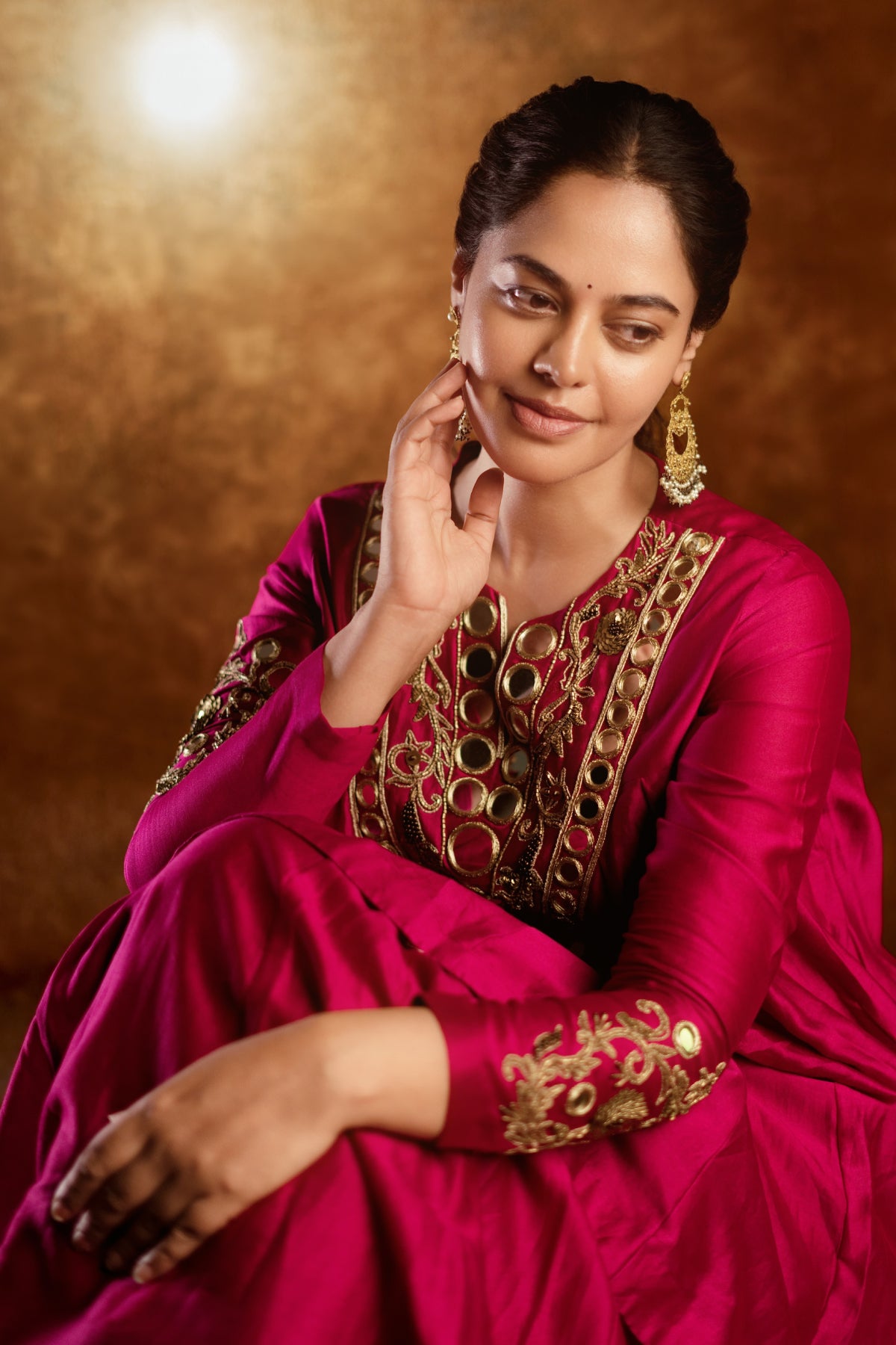 Pure Chanderi silk full-sleeve kalidaar tunic with midi lehenga, hand-embellished with zari and mirror work. Shop Now!