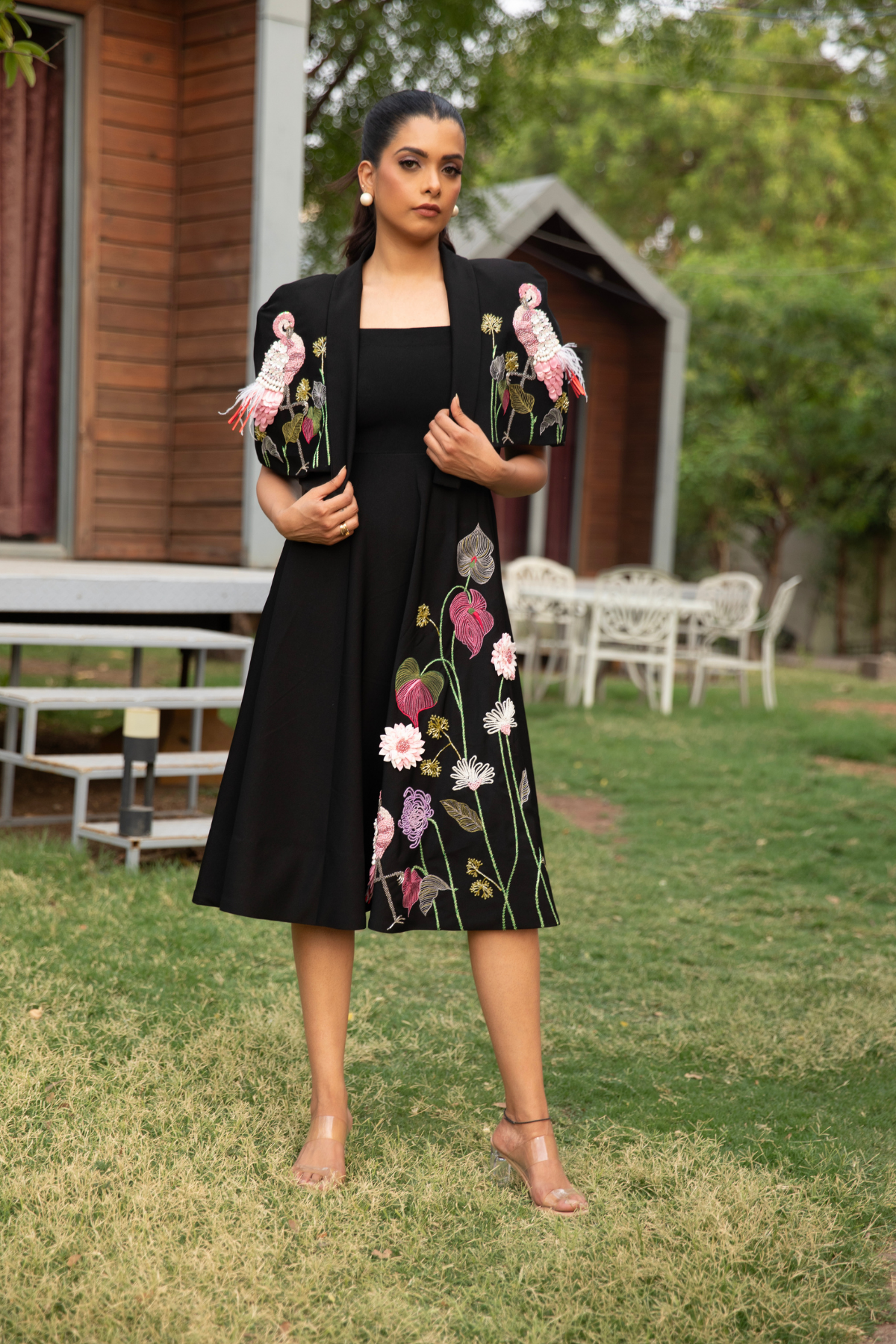 This elegant ensemble features a two piece design The dress is designed with a square neckline with flare silhouette create a line shape with detachable cape Shop Now!