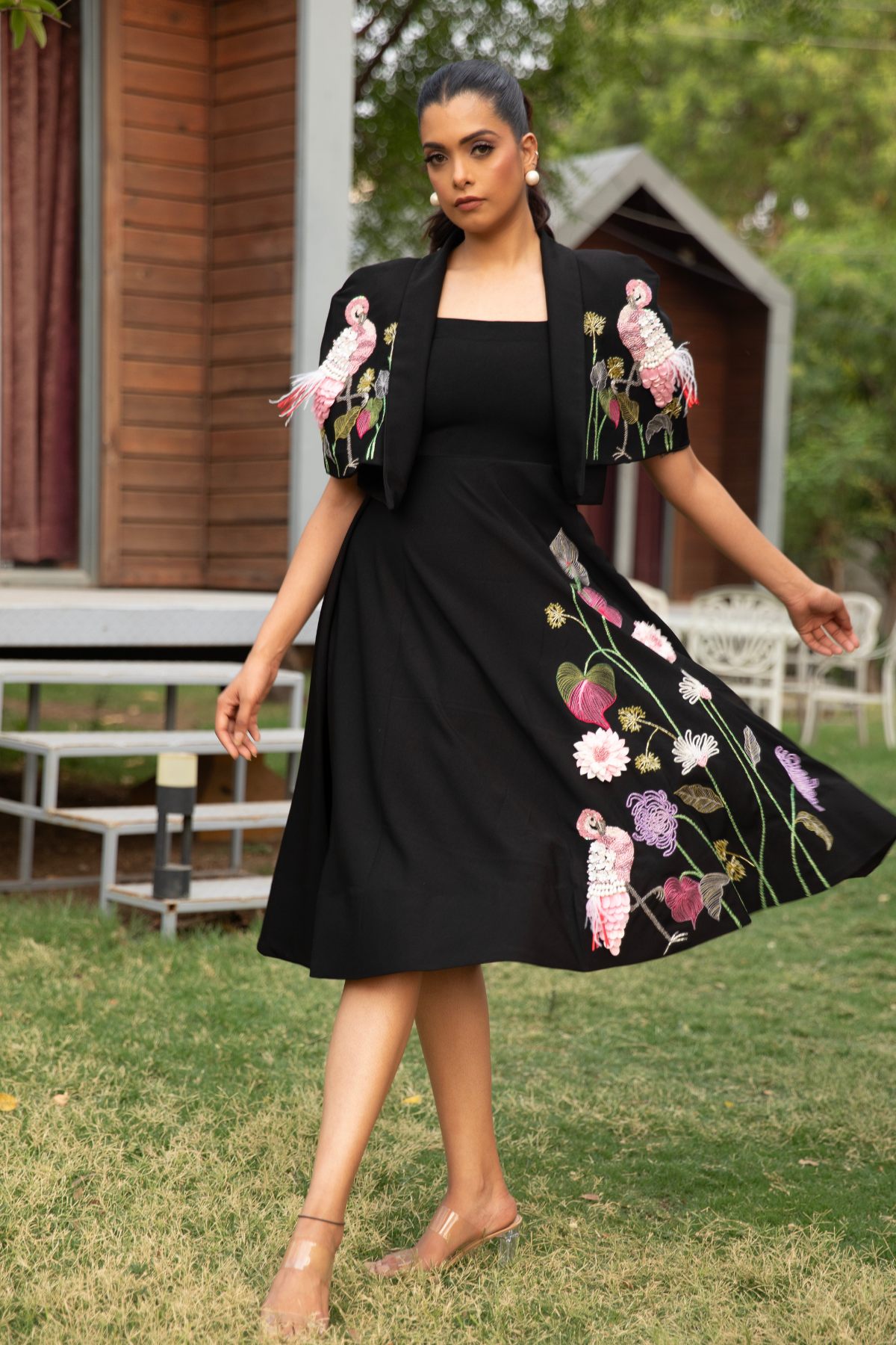 This elegant ensemble features a two piece design The dress is designed with a square neckline with flare silhouette create a line shape with detachable cape Shop Now!