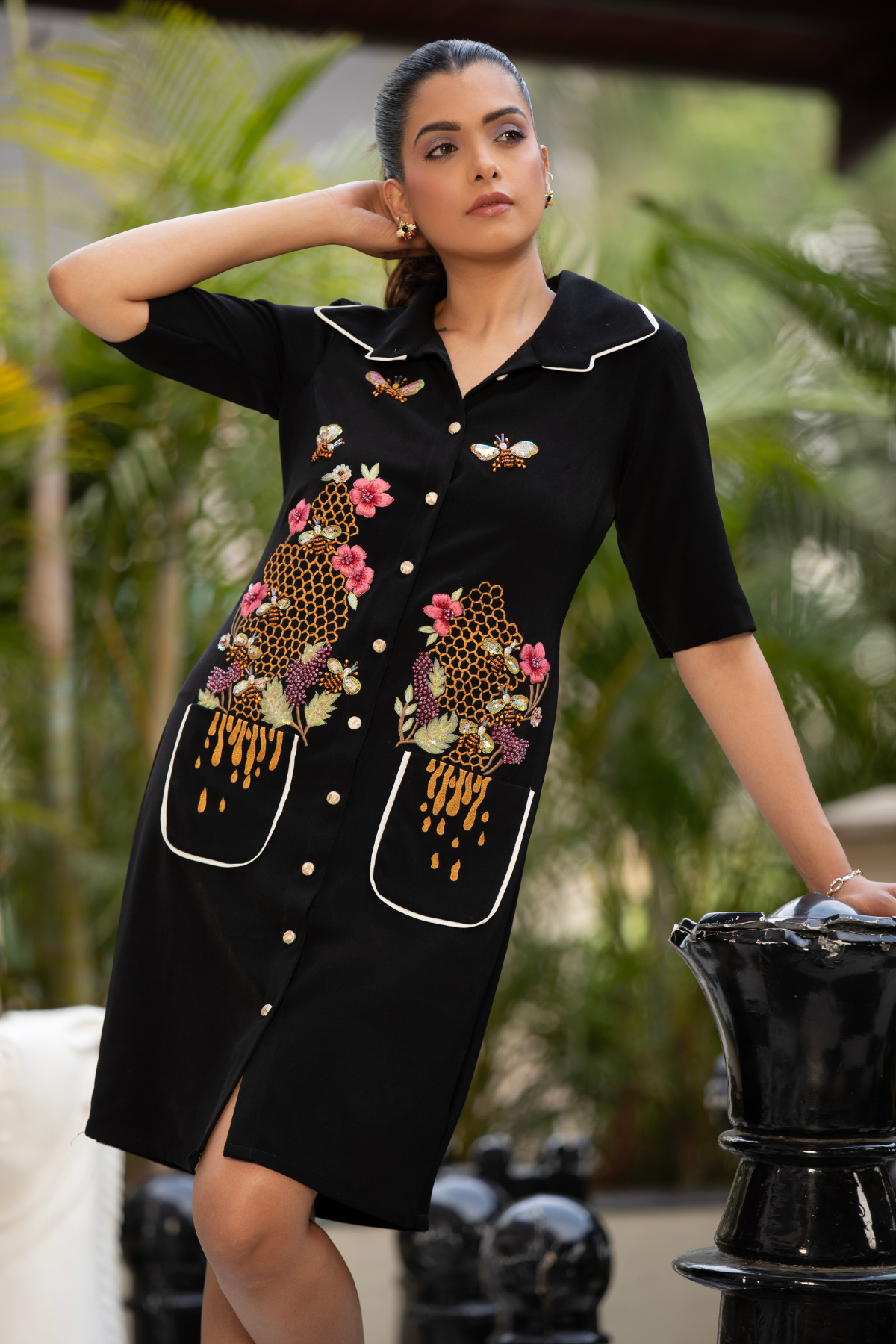 Black shirt dress with intricate color block piping detailing with honey-bee quirky motif for a playful style Shop Now!