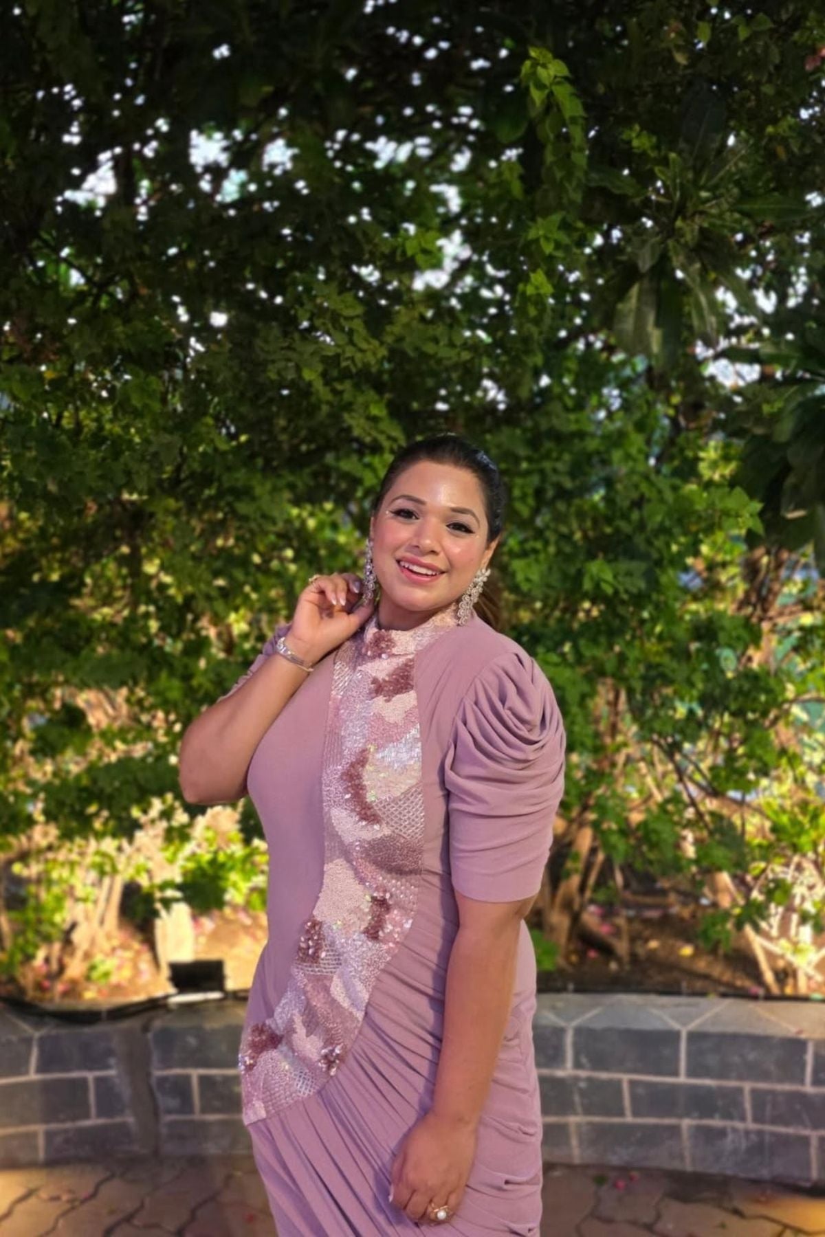 The dress is designed with a flattering form fitting bodycon include soft draping slightly stretchyhigh neck collar and structured puff sleeves shimmering multi tone sequins that flow from neckline to down across. Shop Now!
