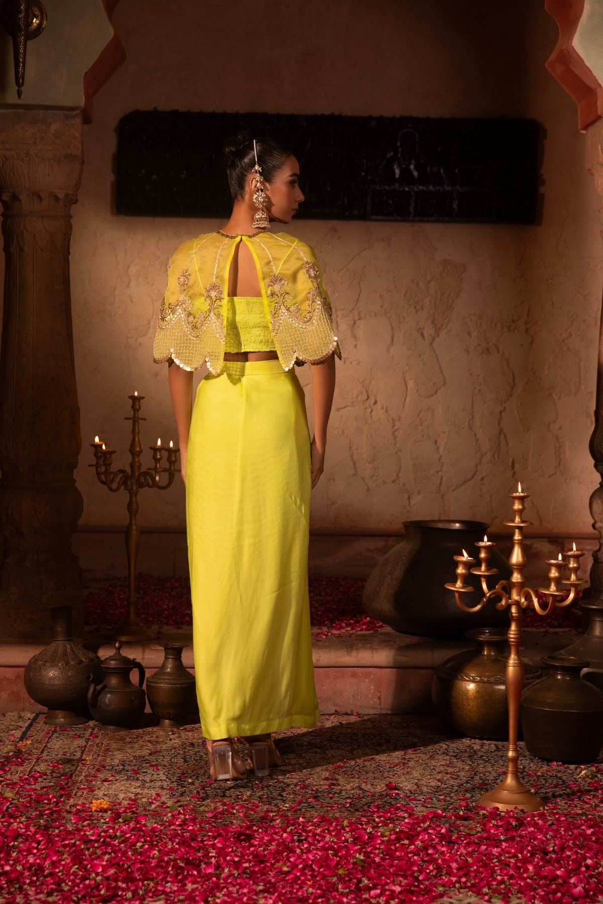 Lime organza satin draped skirt and crop top with scalloped organza cape, intricately hand-embellished in Rococo motifs. Shop Now!