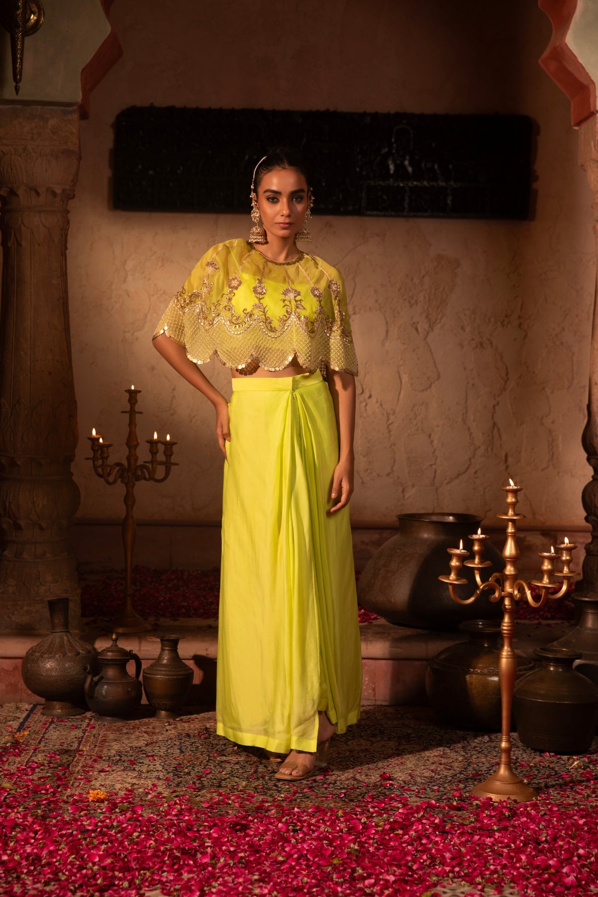 Lime organza satin draped skirt and crop top with scalloped organza cape, intricately hand-embellished in Rococo motifs. Shop Now!