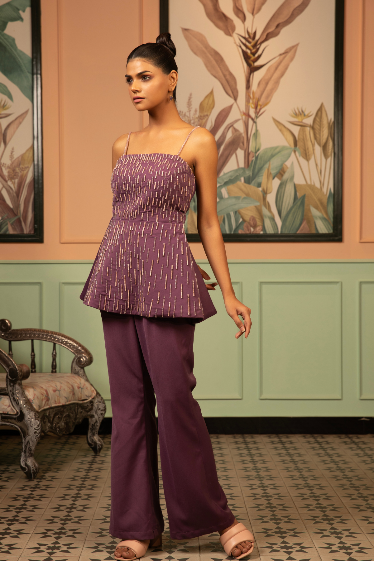 Two piece purple coord set offer a contemporary fusion look strappy neckline structured peplum geometric embroidery paired with matching solid tone wide leg palazzo pant Shop Now!