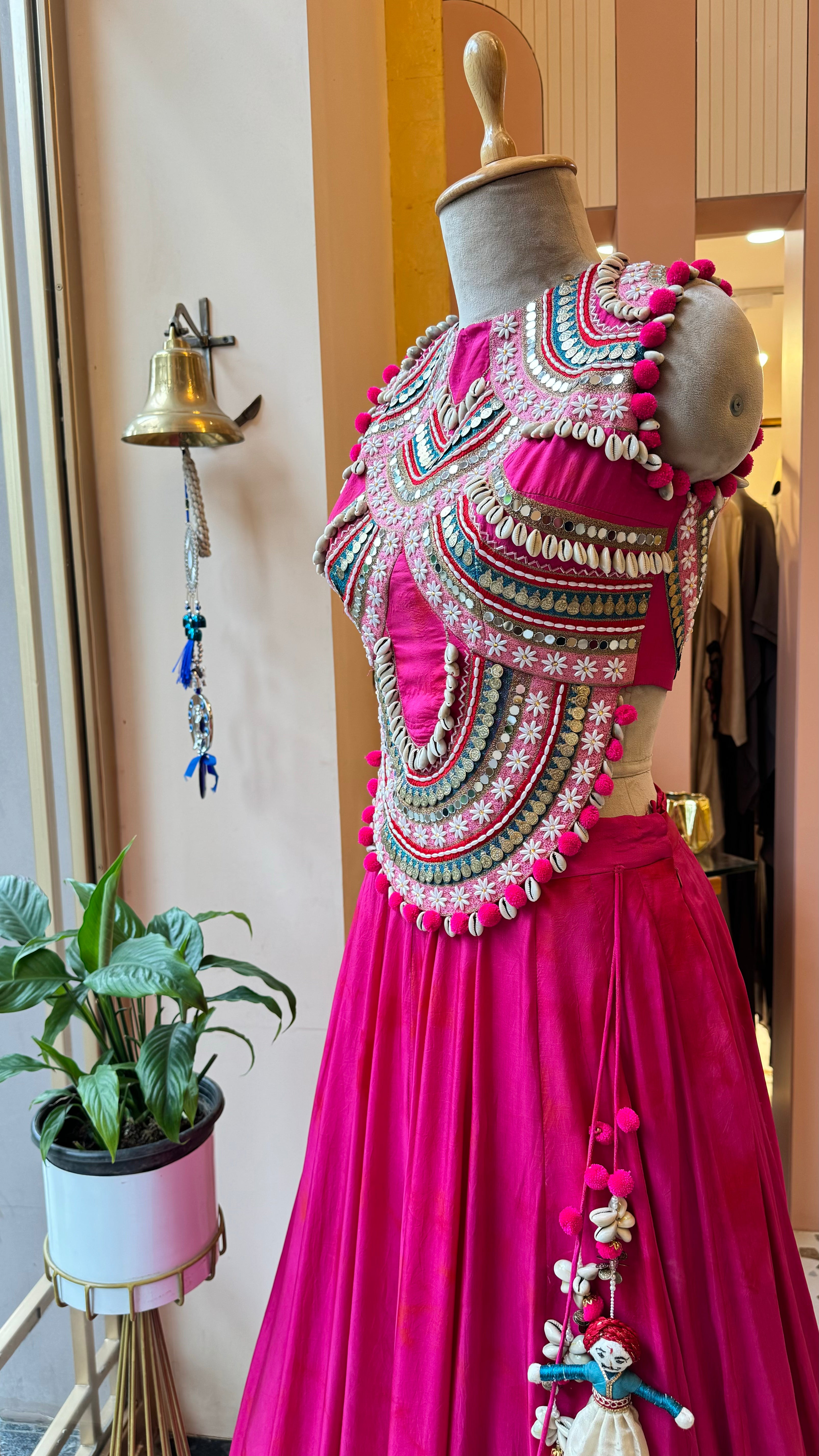 2 Cinnamon Rolls in Rani Pink Tie dye Croptop-Lehenga Set. Shop Now!