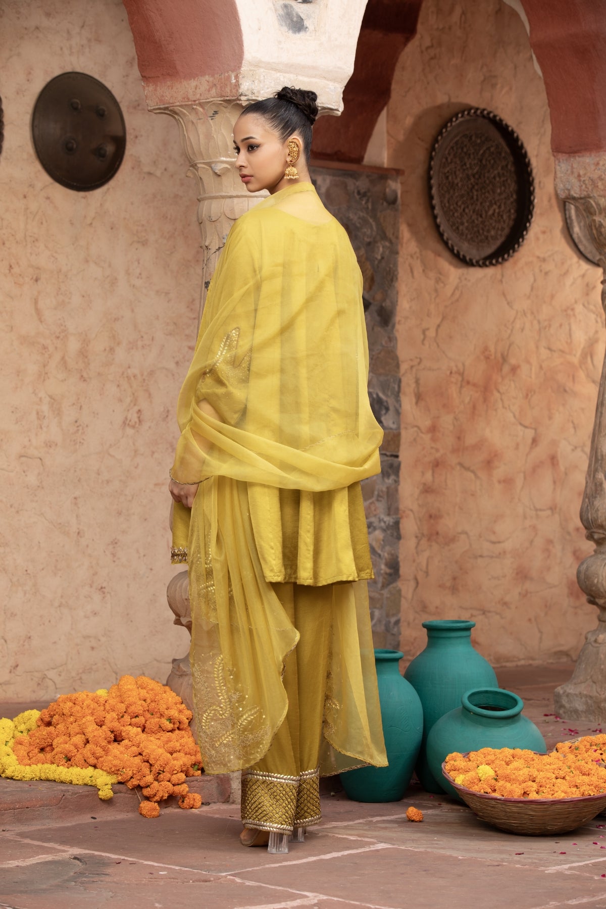 Lime slub satin short anarkali with scalloped hem and trousers, paired with a hand-detailed organza dupatta. Shop Now!