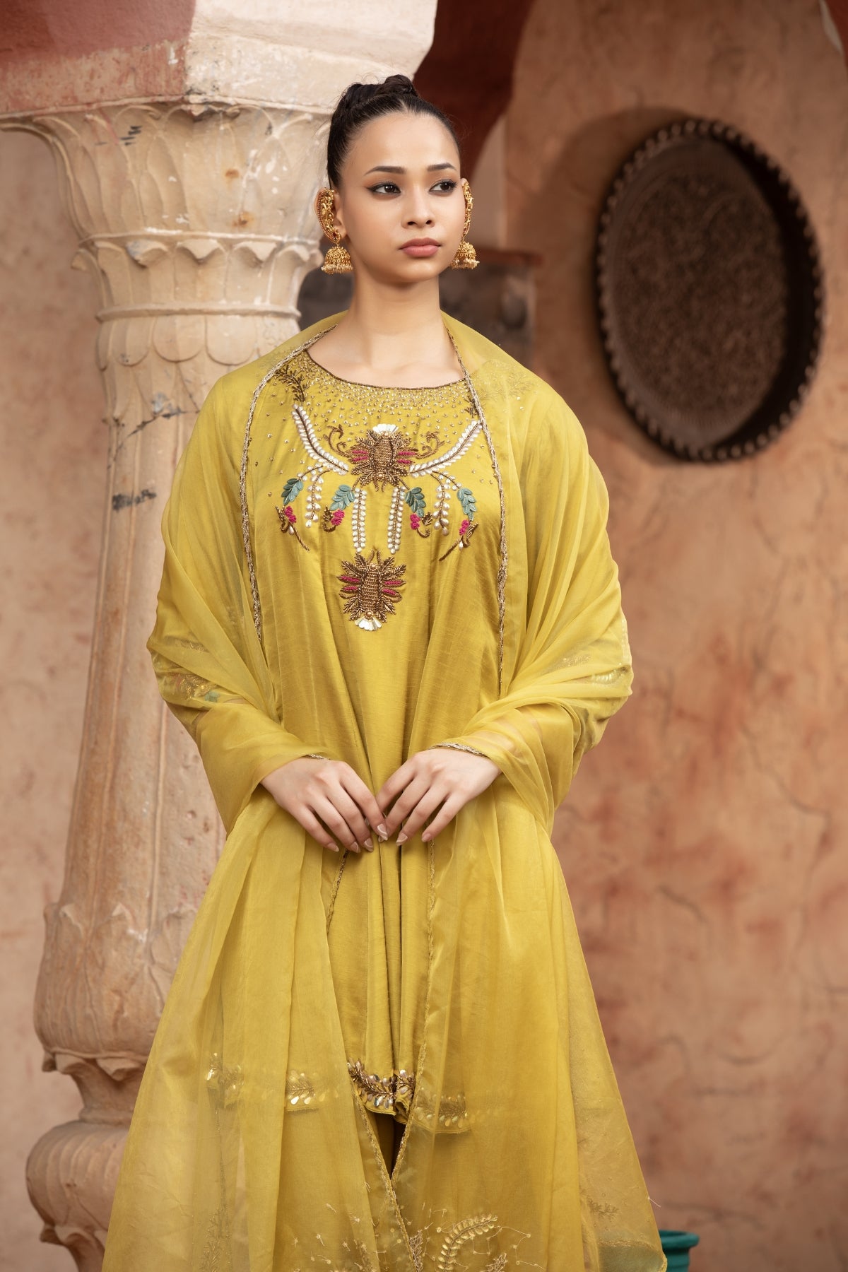 Lime slub satin short anarkali with scalloped hem and trousers, paired with a hand-detailed organza dupatta. Shop Now!