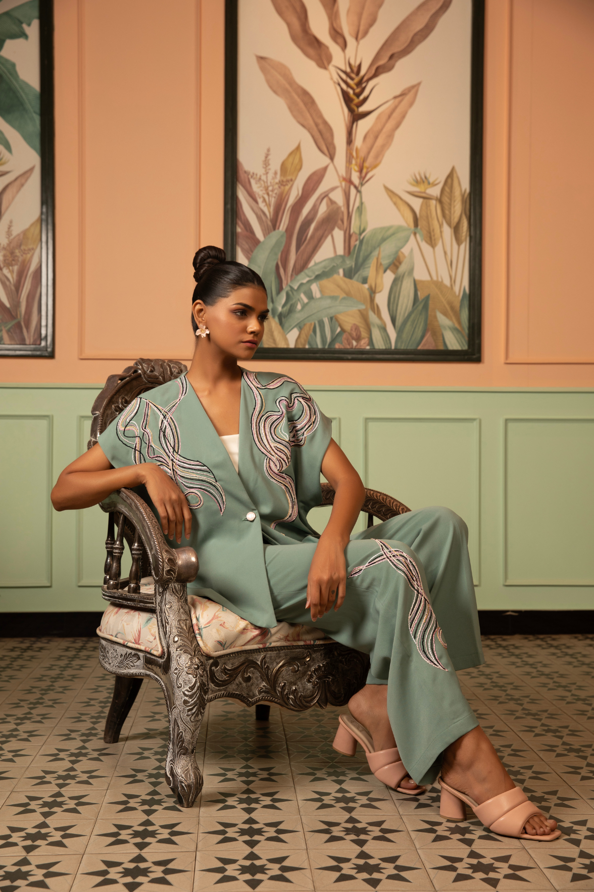 This sage green co-ord set features a contemporary indo western intricate white hand embroidery and thread detailing on both top and bottom Shop Now!