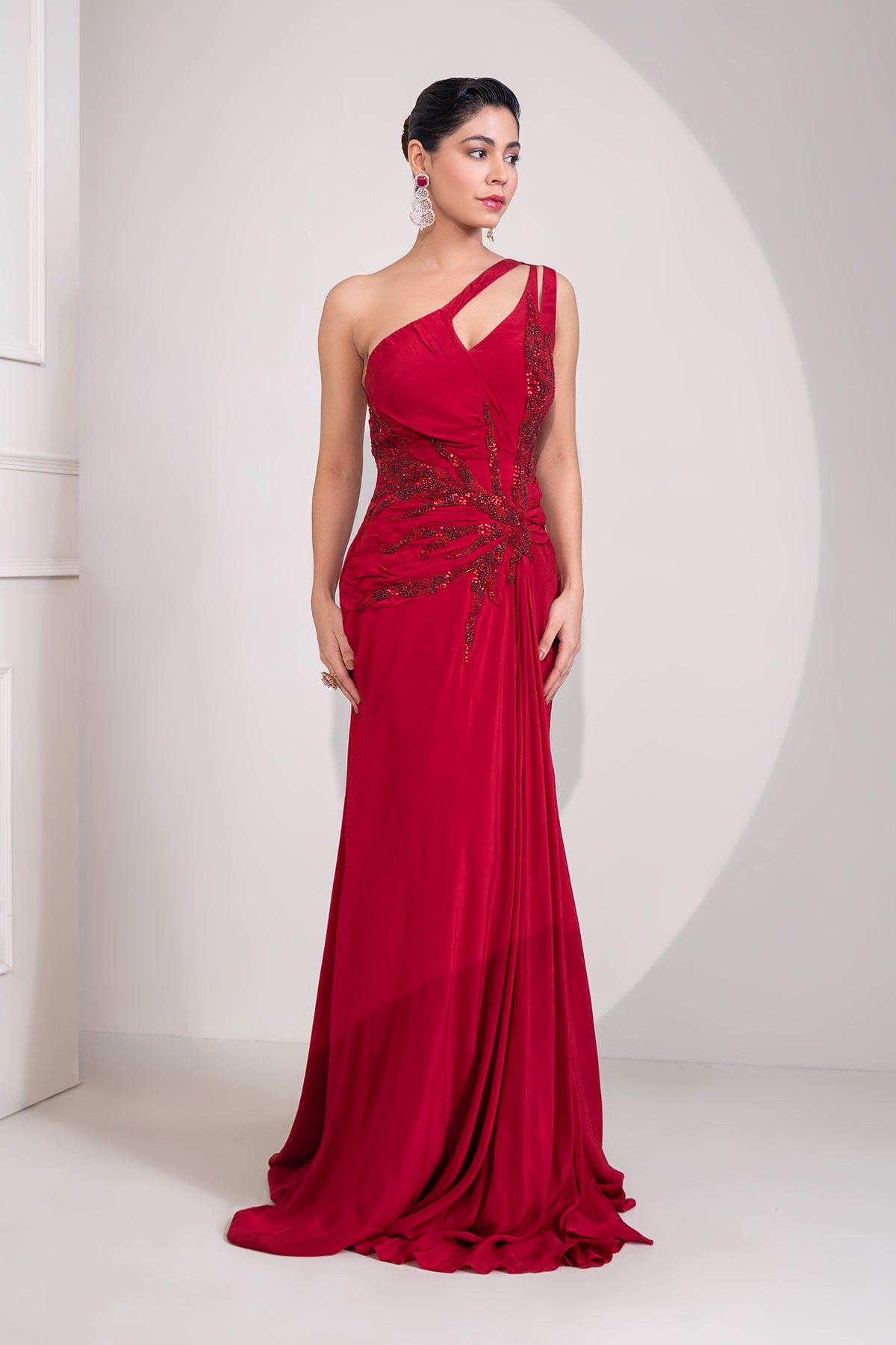 Ruby red one shoulder draped cocktail gown abstract work
