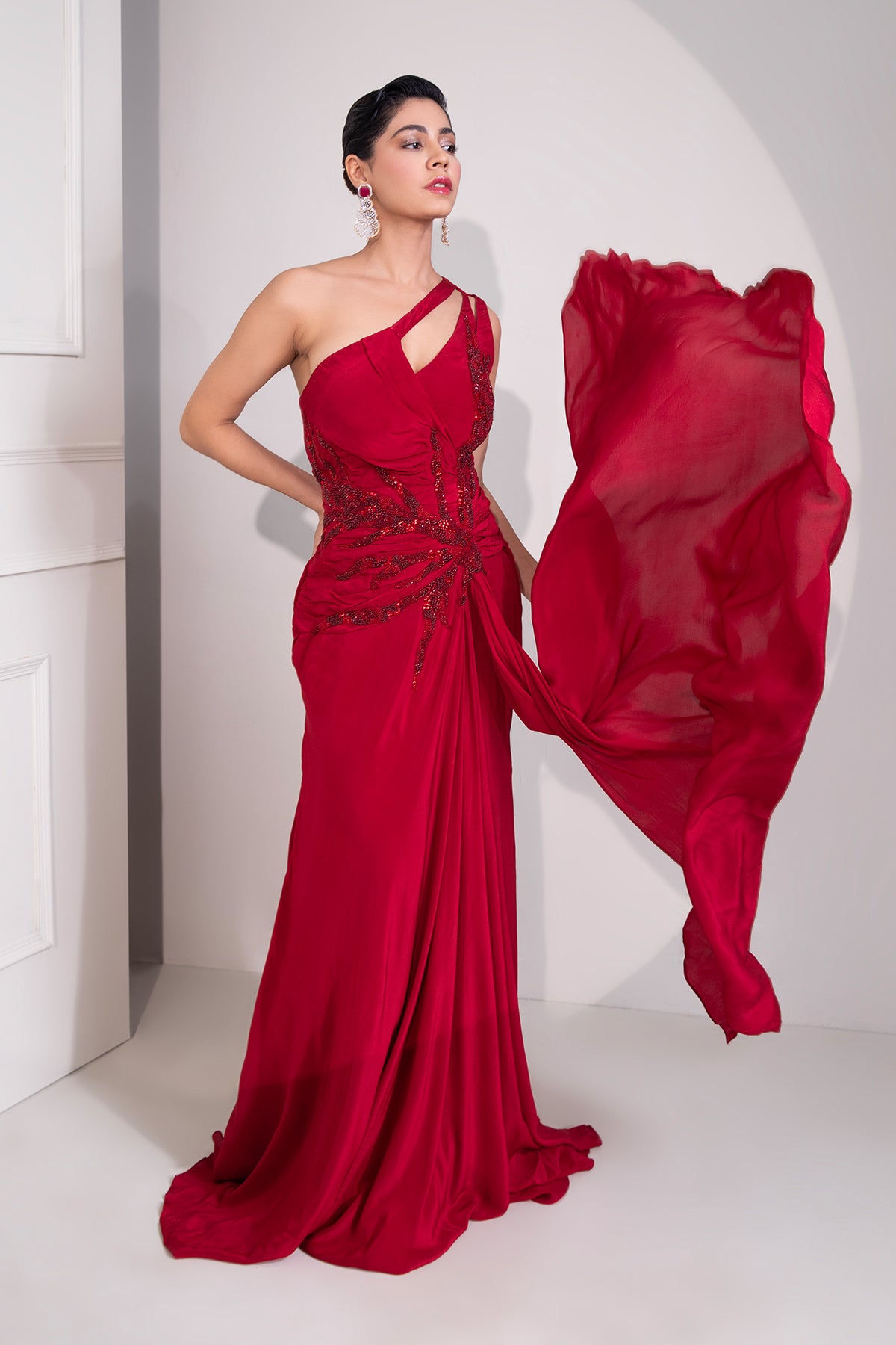 Ruby red one shoulder draped cocktail gown abstract work