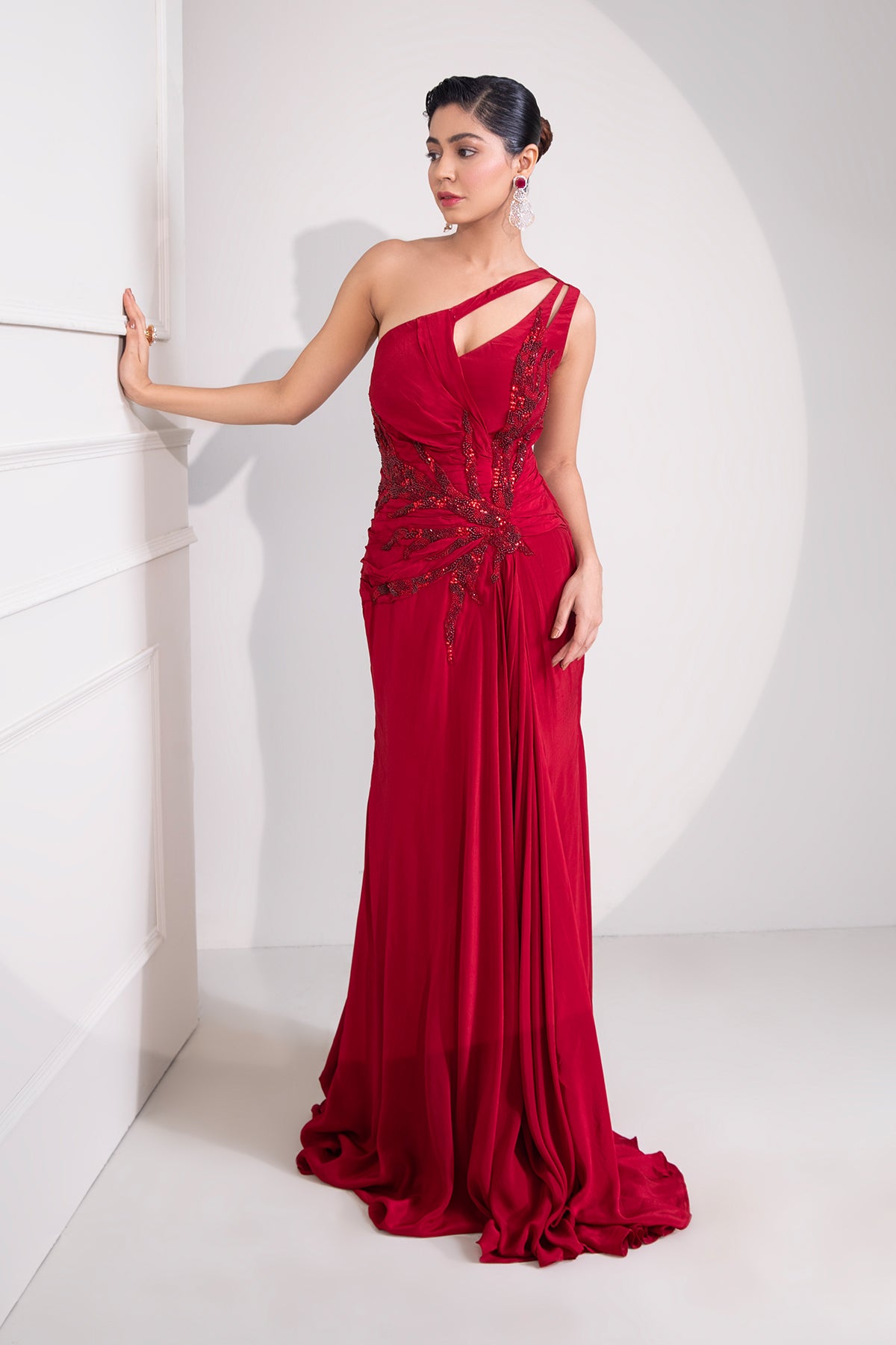 Ruby red one shoulder draped cocktail gown abstract work