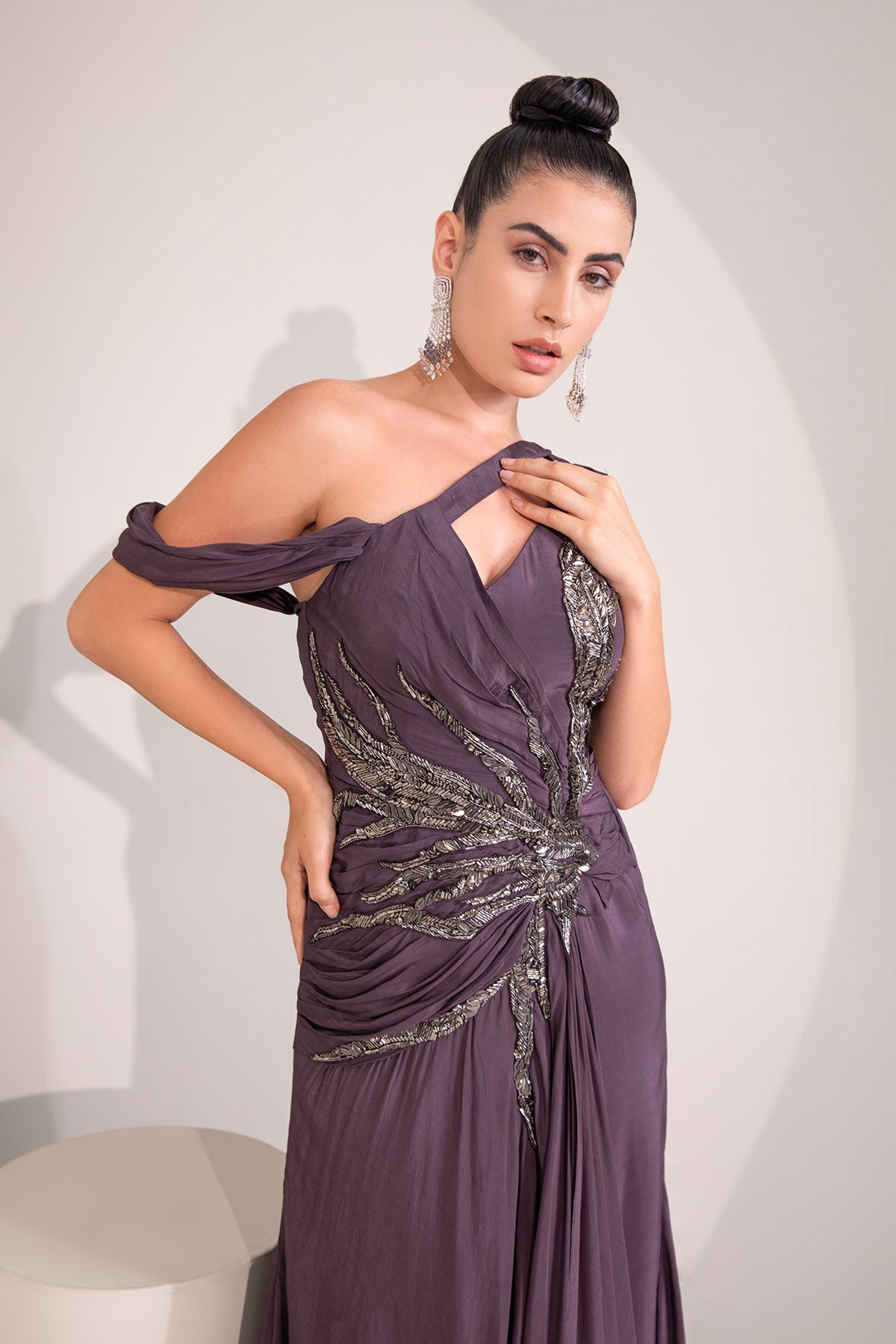 Midnight plum one shoulder gown with abstract work