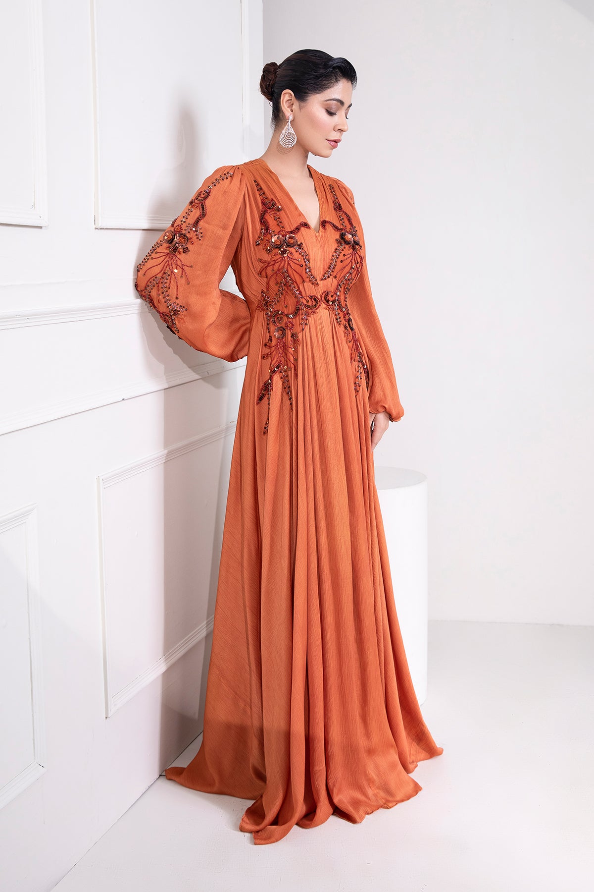 Brunt Orange draped flare gown with intricate tonal embroidery