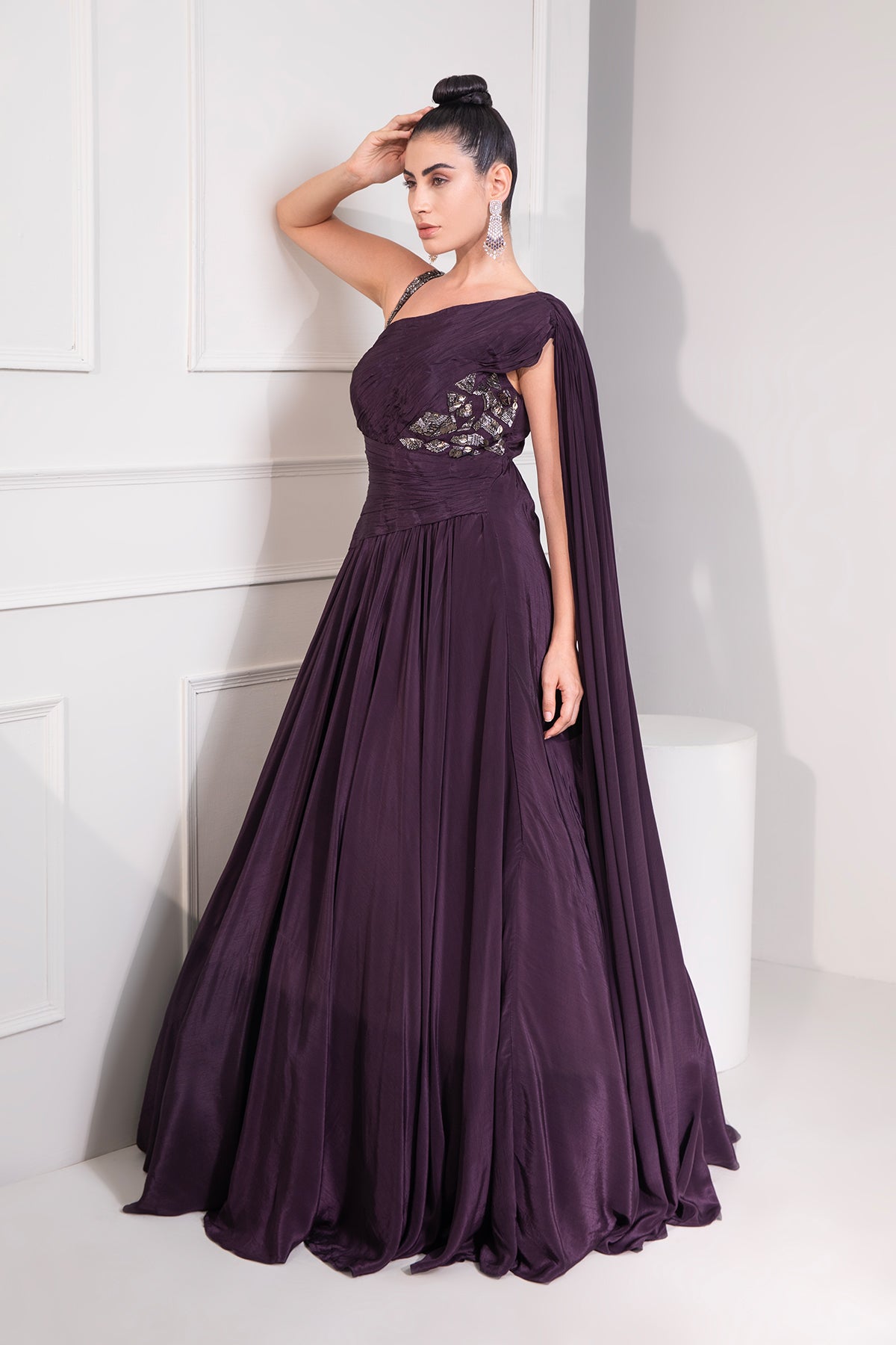 Midnight plum draped cutdana flared gown