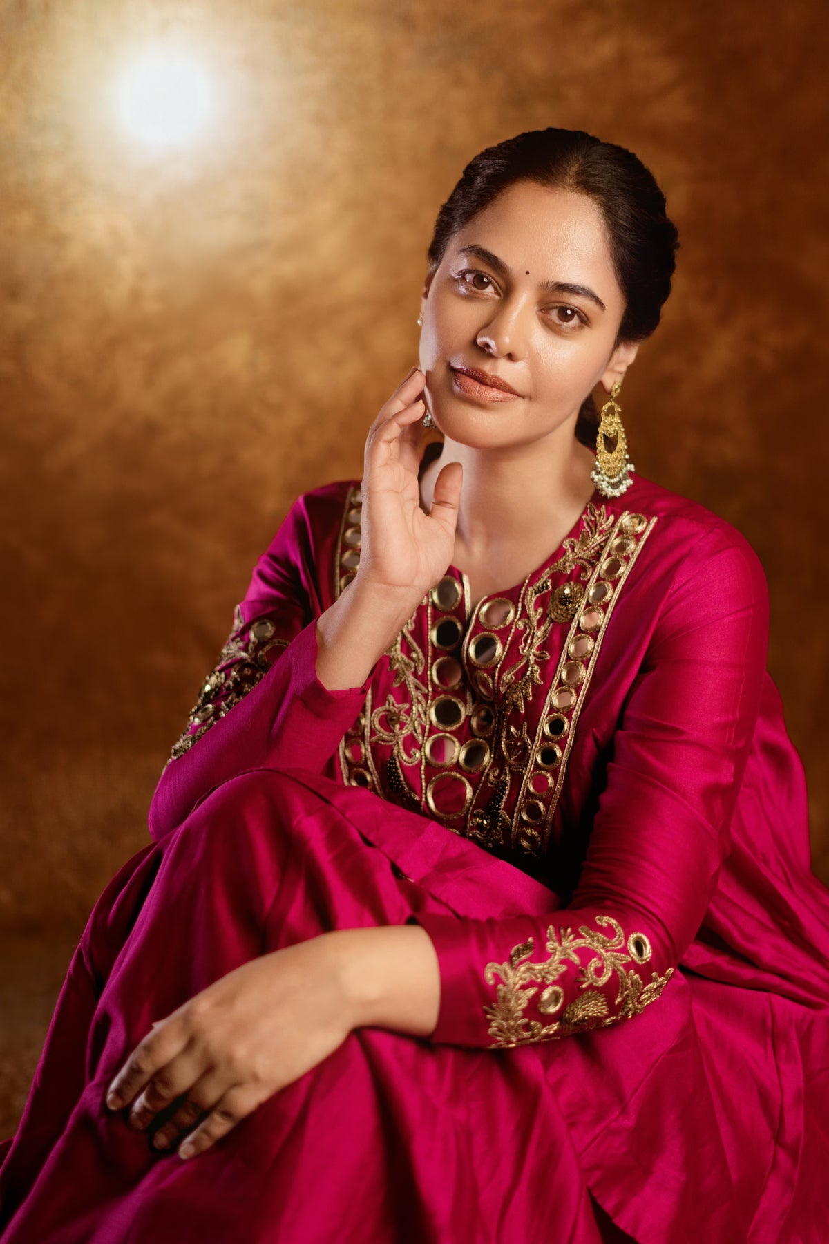 Pure Chanderi silk full-sleeve kalidaar tunic with midi lehenga, hand-embellished with zari and mirror work. Shop Now!