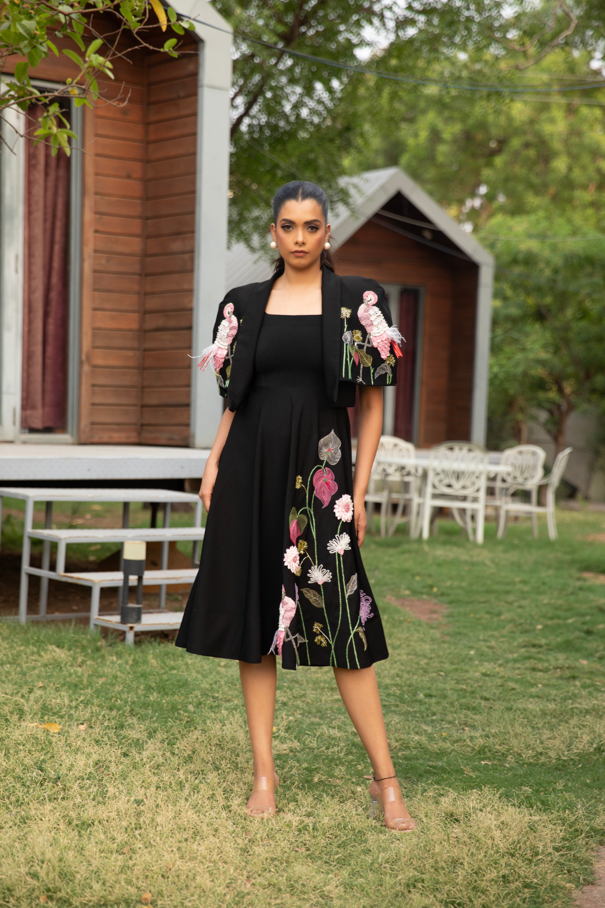 This elegant ensemble features a two piece design The dress is designed with a square neckline with flare silhouette create a line shape with detachable cape Shop Now!