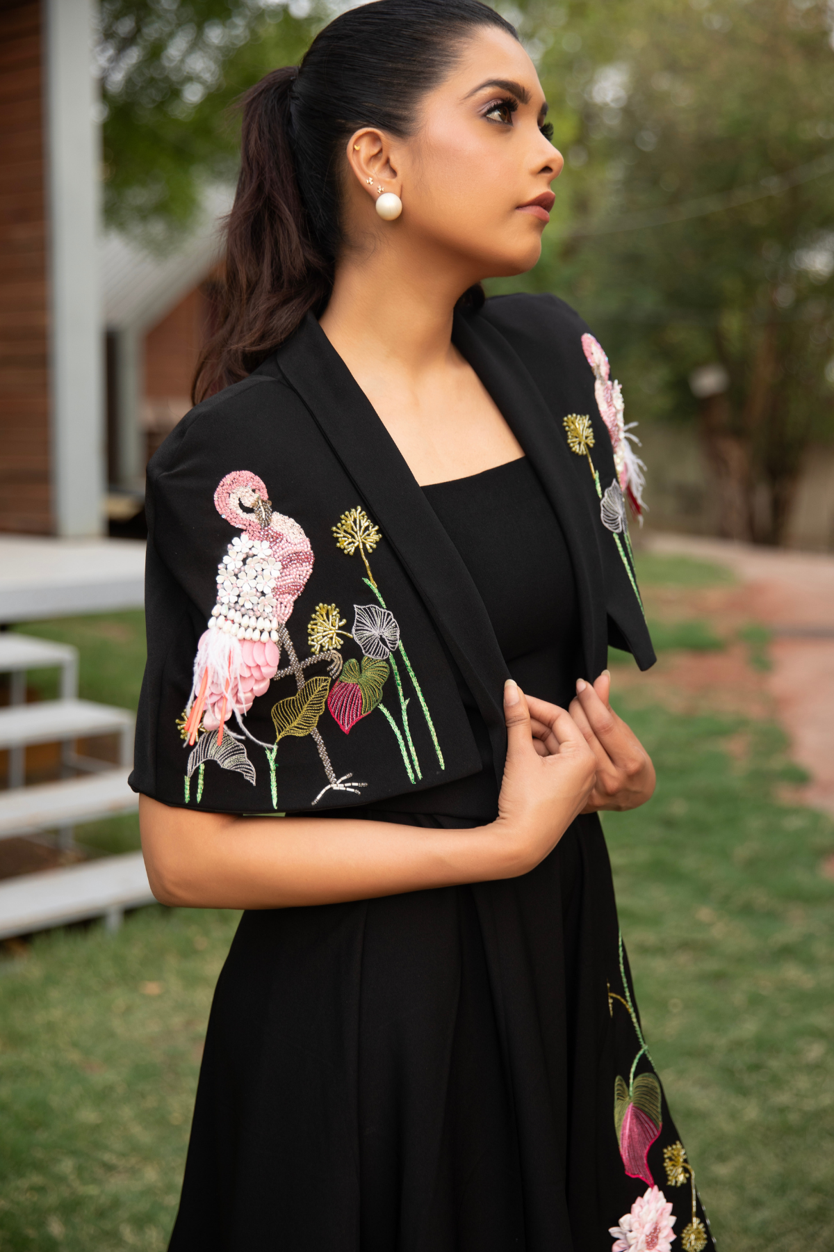 This elegant ensemble features a two piece design The dress is designed with a square neckline with flare silhouette create a line shape with detachable cape Shop Now!