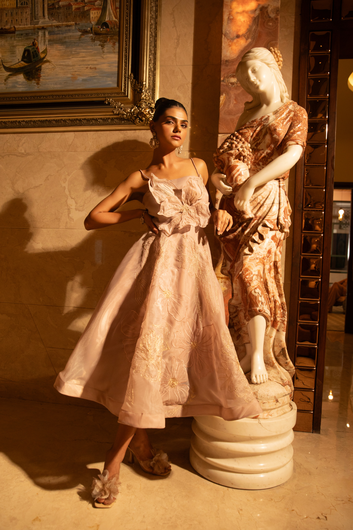 The focal point is a dramatic oversized 3D fabric floral motif sculpted Shop Now!