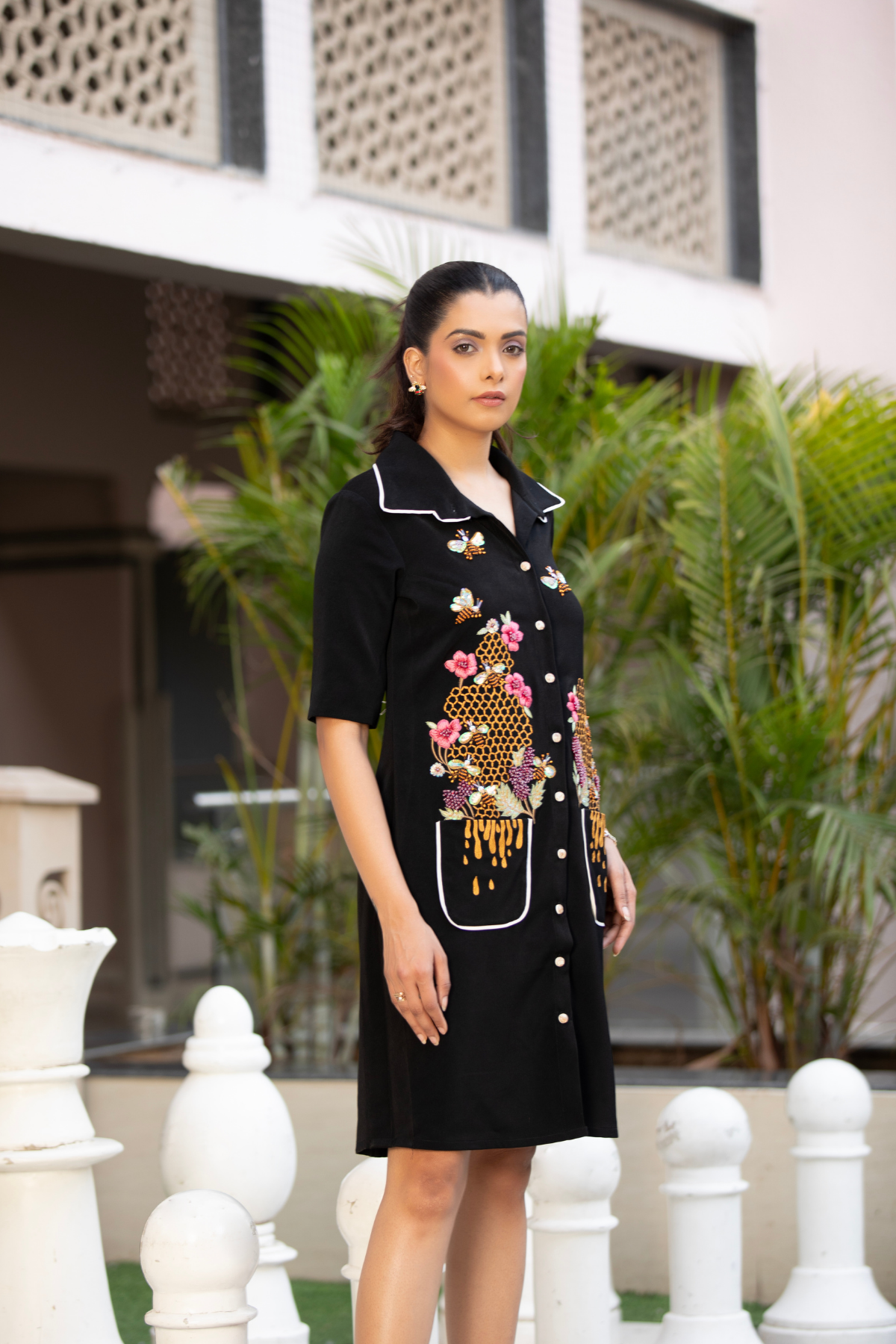 Black shirt dress with intricate color block piping detailing with honey-bee quirky motif for a playful style Shop Now!