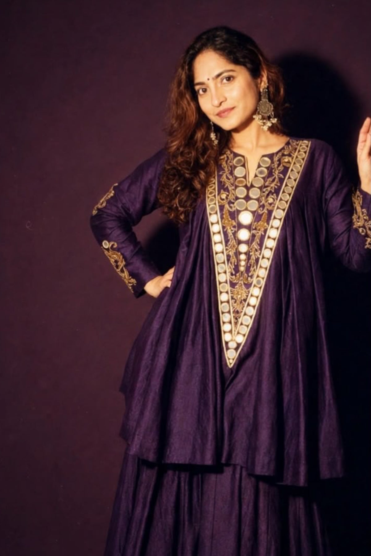 Pure Chanderi silk full-sleeve kalidaar tunic with midi lehenga, intricately hand-embellished with zari and mirror work. Shop Now!