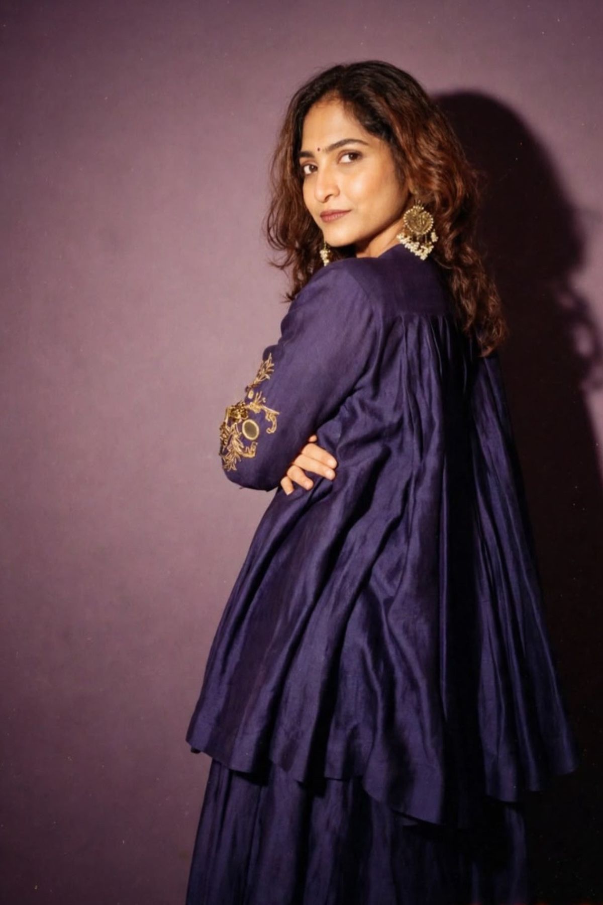 Pure Chanderi silk full-sleeve kalidaar tunic with midi lehenga, intricately hand-embellished with zari and mirror work. Shop Now!