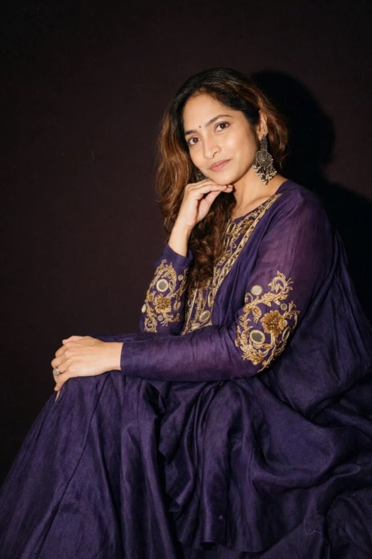 Pure Chanderi silk full-sleeve kalidaar tunic with midi lehenga, intricately hand-embellished with zari and mirror work. Shop Now!