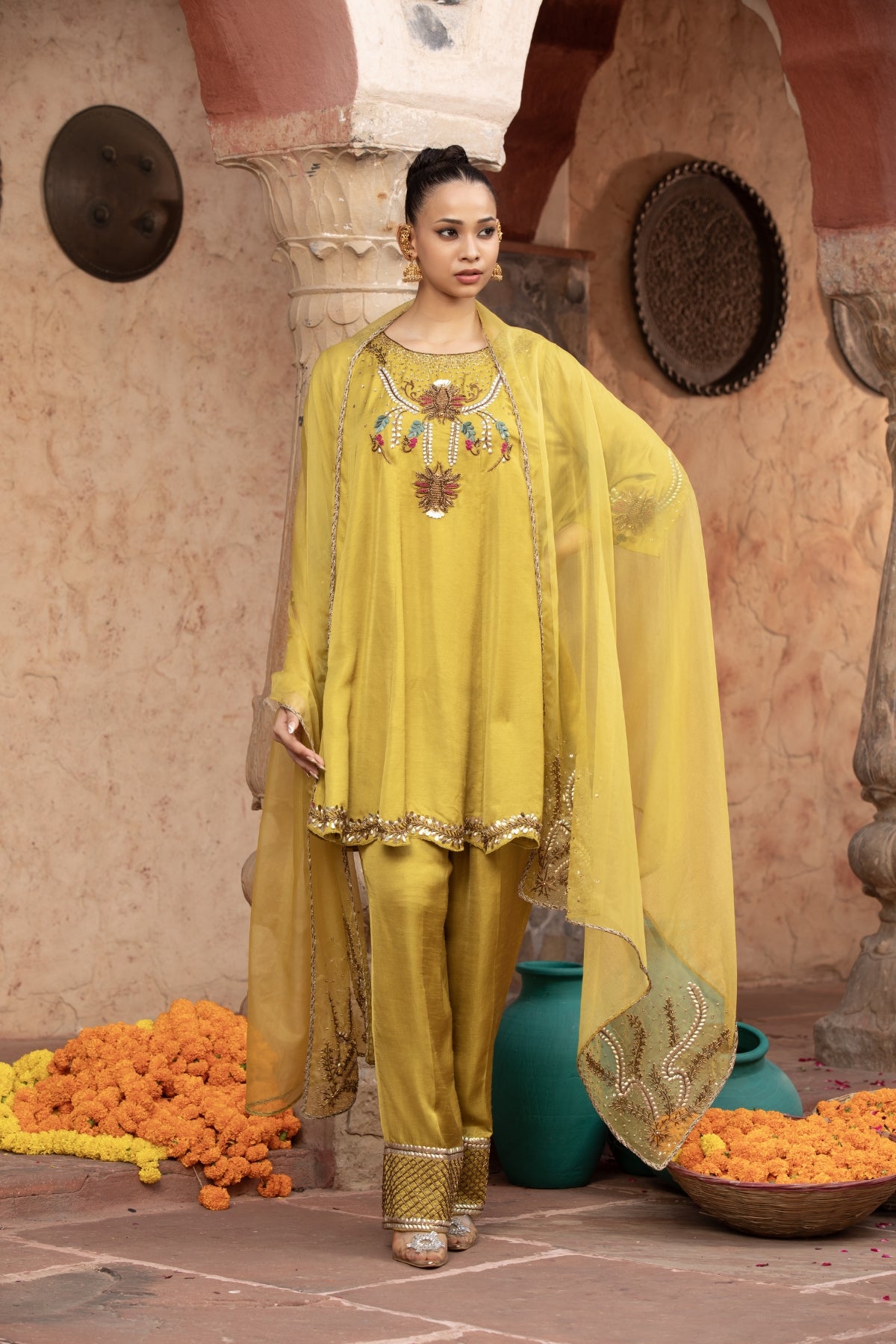 Lime slub satin short anarkali with scalloped hem and trousers, paired with a hand-detailed organza dupatta. Shop Now!