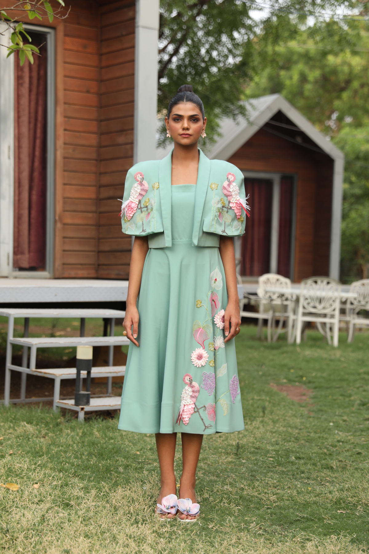 This elegant ensemble features a two piece design The dress is designed with a square  neckline with flare silhouette create a line shape with detachable cape  Shop Now!