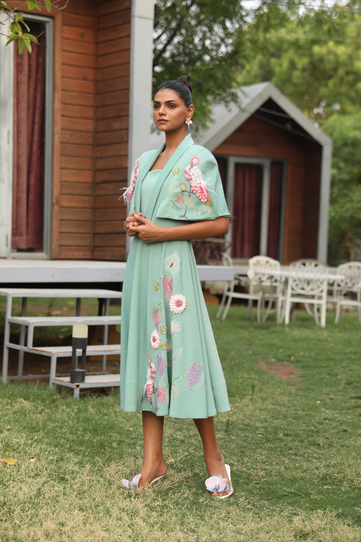 This elegant ensemble features a two piece design The dress is designed with a square  neckline with flare silhouette create a line shape with detachable cape  Shop Now!