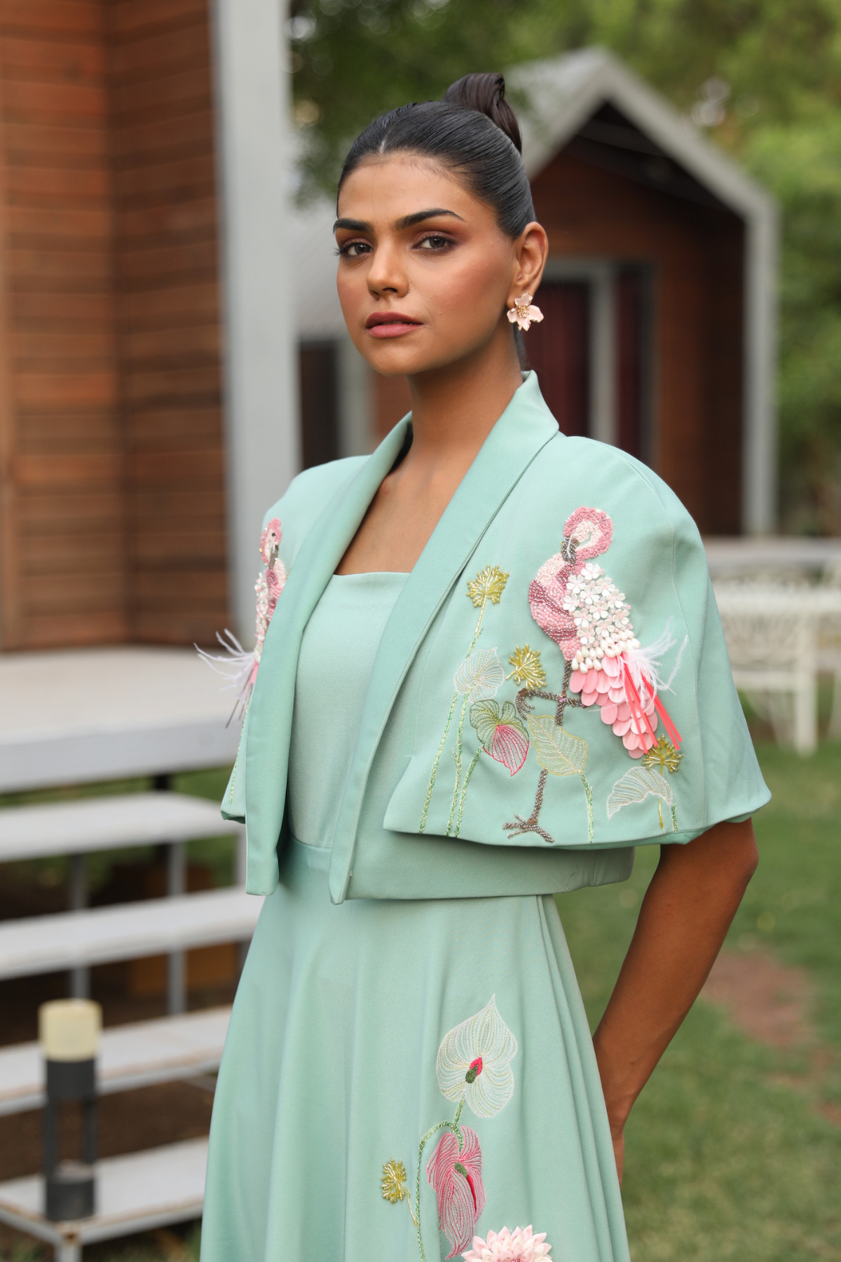 This elegant ensemble features a two piece design The dress is designed with a square  neckline with flare silhouette create a line shape with detachable cape  Shop Now!