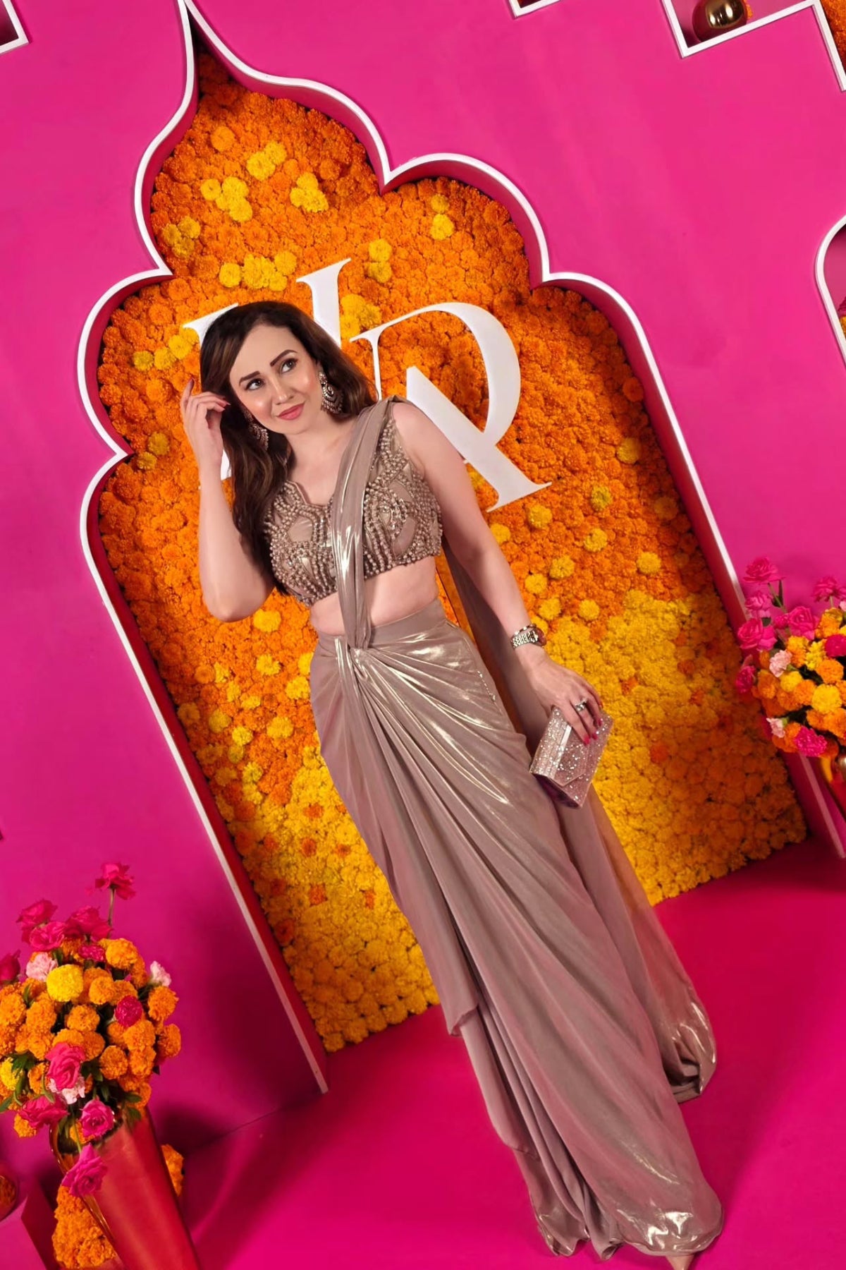 Golden chiffon foil pre-draped saree with an intricately hand-embellished blouse. Shop Now!