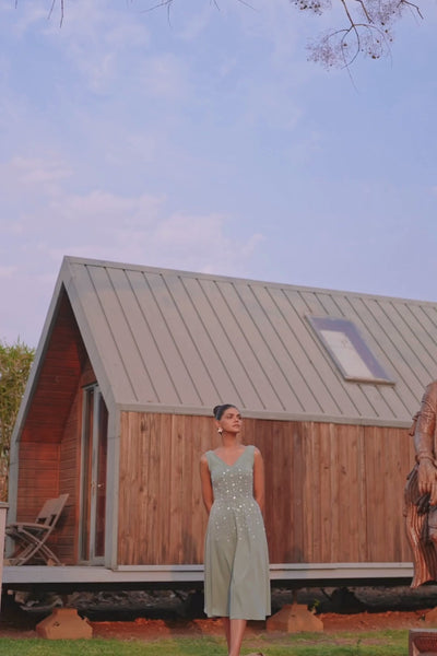 A line sleeveless midi dress in soft mint v neck line paired with fitted bodice tonal floral embroidery Shop Now!