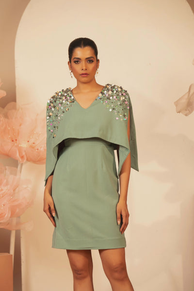 The dress is heavily embellished cape overlay over the shoulder and drape down past the waist wide v neck Shop Now!
