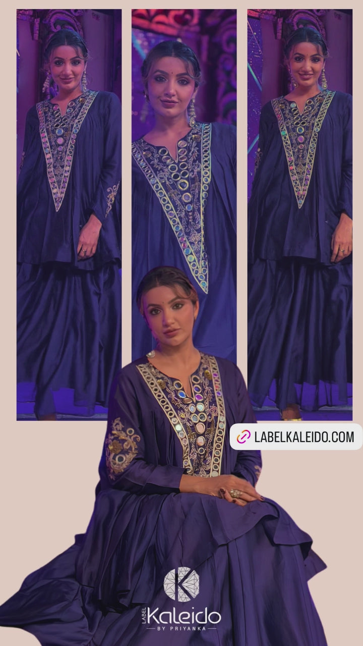 Pure Chanderi silk full-sleeve kalidaar tunic with midi lehenga, intricately hand-eNow!mbellished with zari and mirror work. Shop Now!