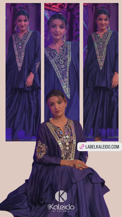Pure Chanderi silk full-sleeve kalidaar tunic with midi lehenga, intricately hand-eNow!mbellished with zari and mirror work. Shop Now!